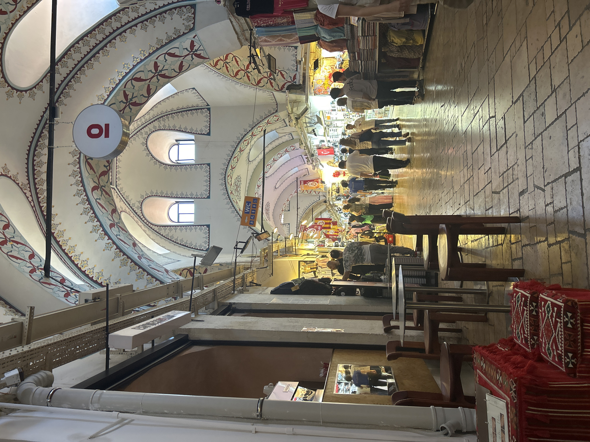 Tourist documents Grand Bazaar visit, Turkish coffee culture in Istanbul