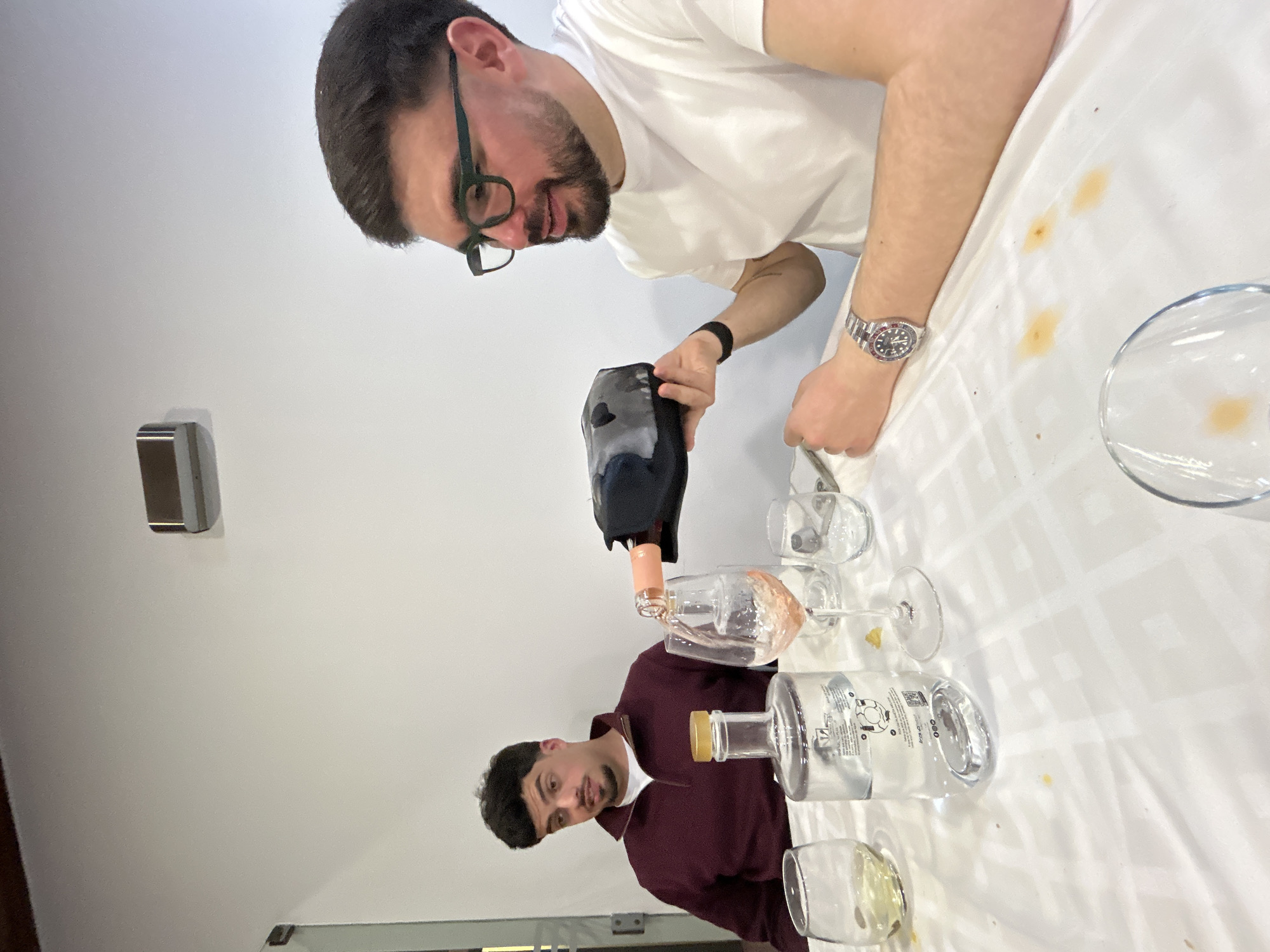 Two men dining at restaurant in Mirandela, Portugal