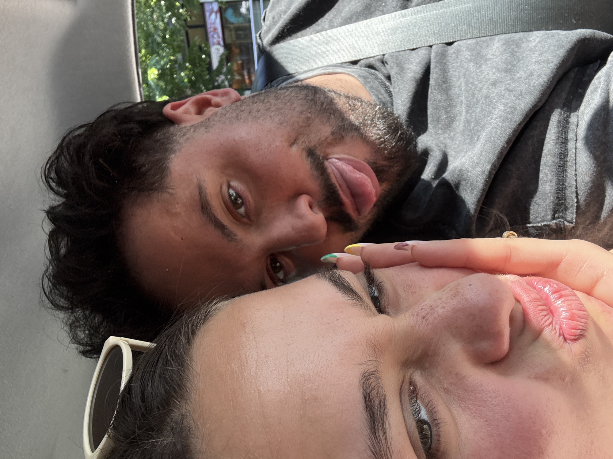 Car passengers documented during afternoon travel in Milan