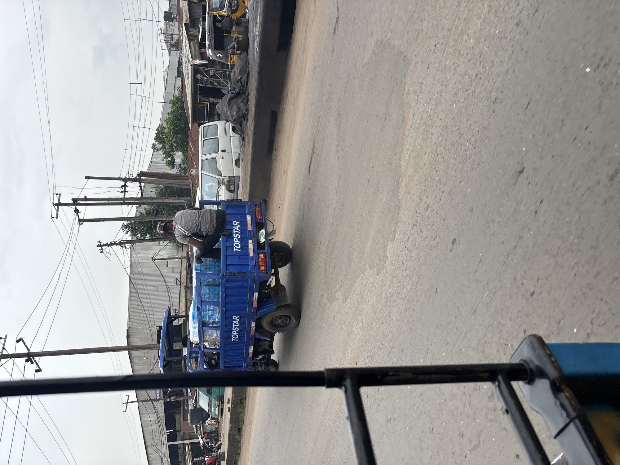 Through Onitsha's busy streets, traffic and commerce in motion