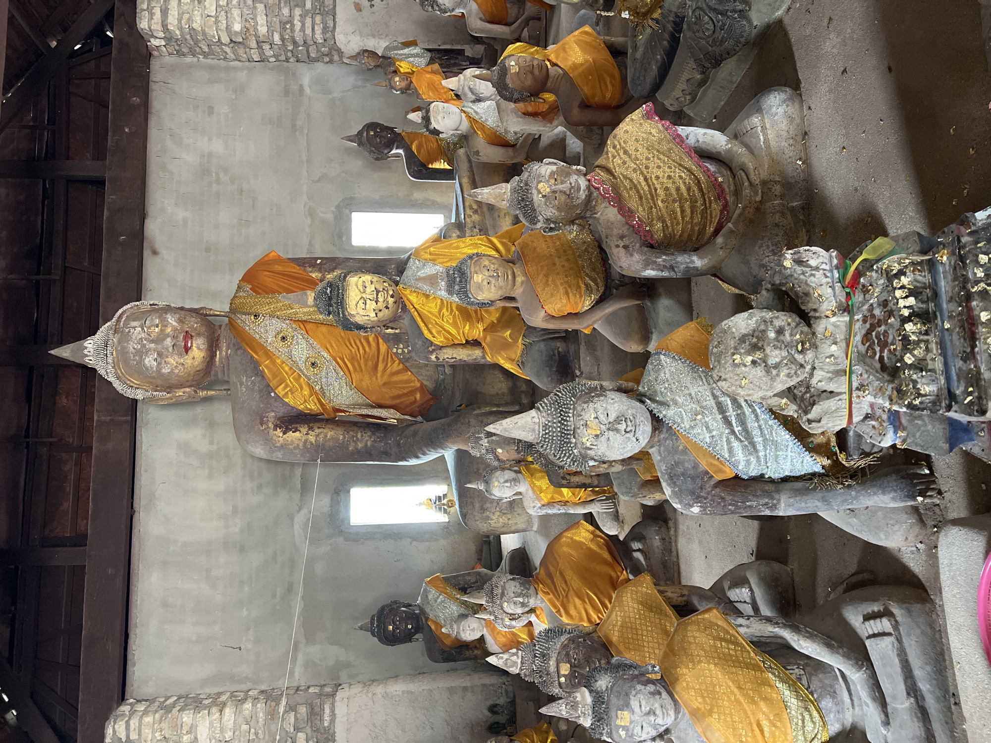 Inside and outside a statue-filled temple in Baan Harn