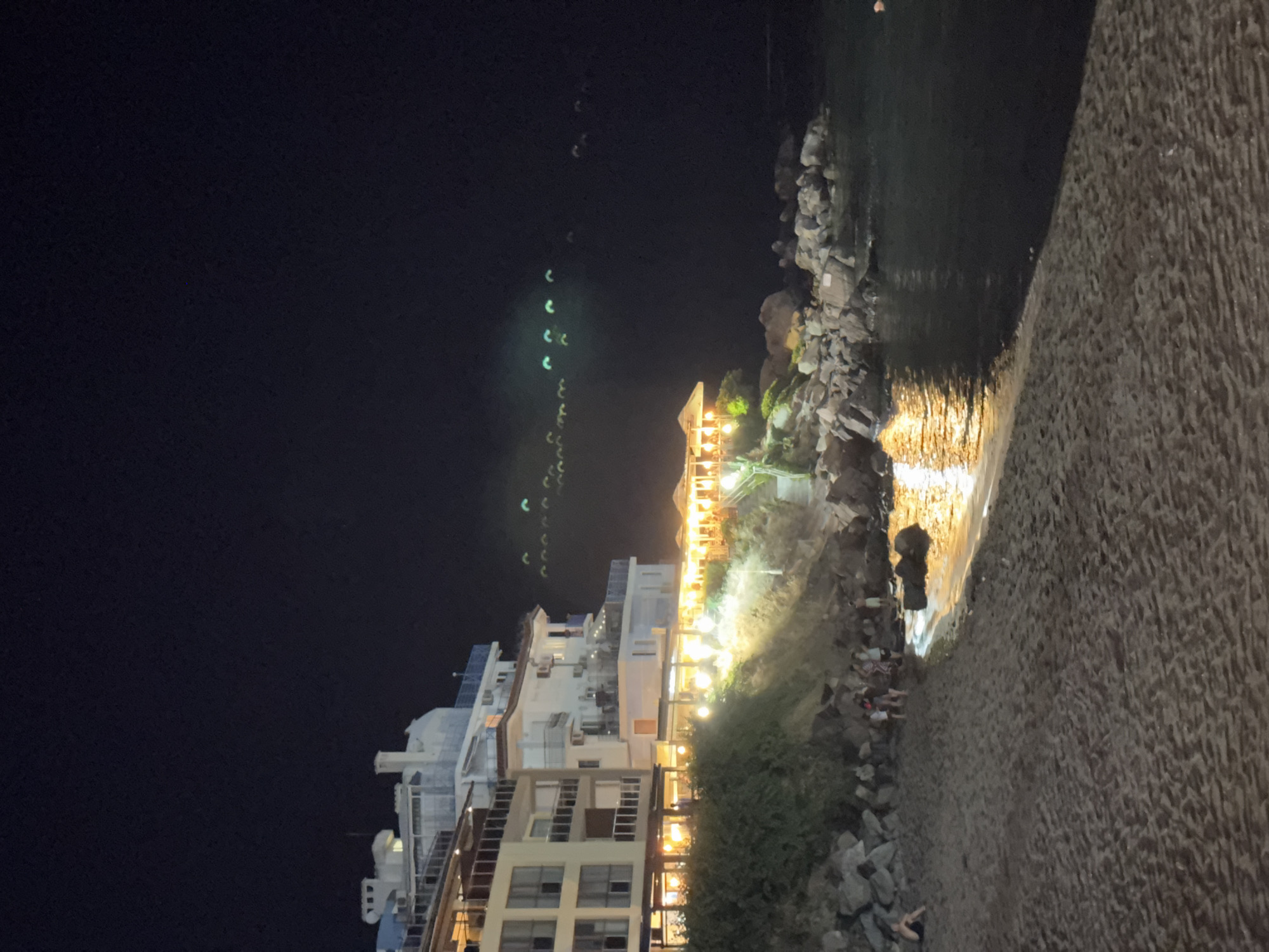 Red moon rises over Sozopol beach on a July night