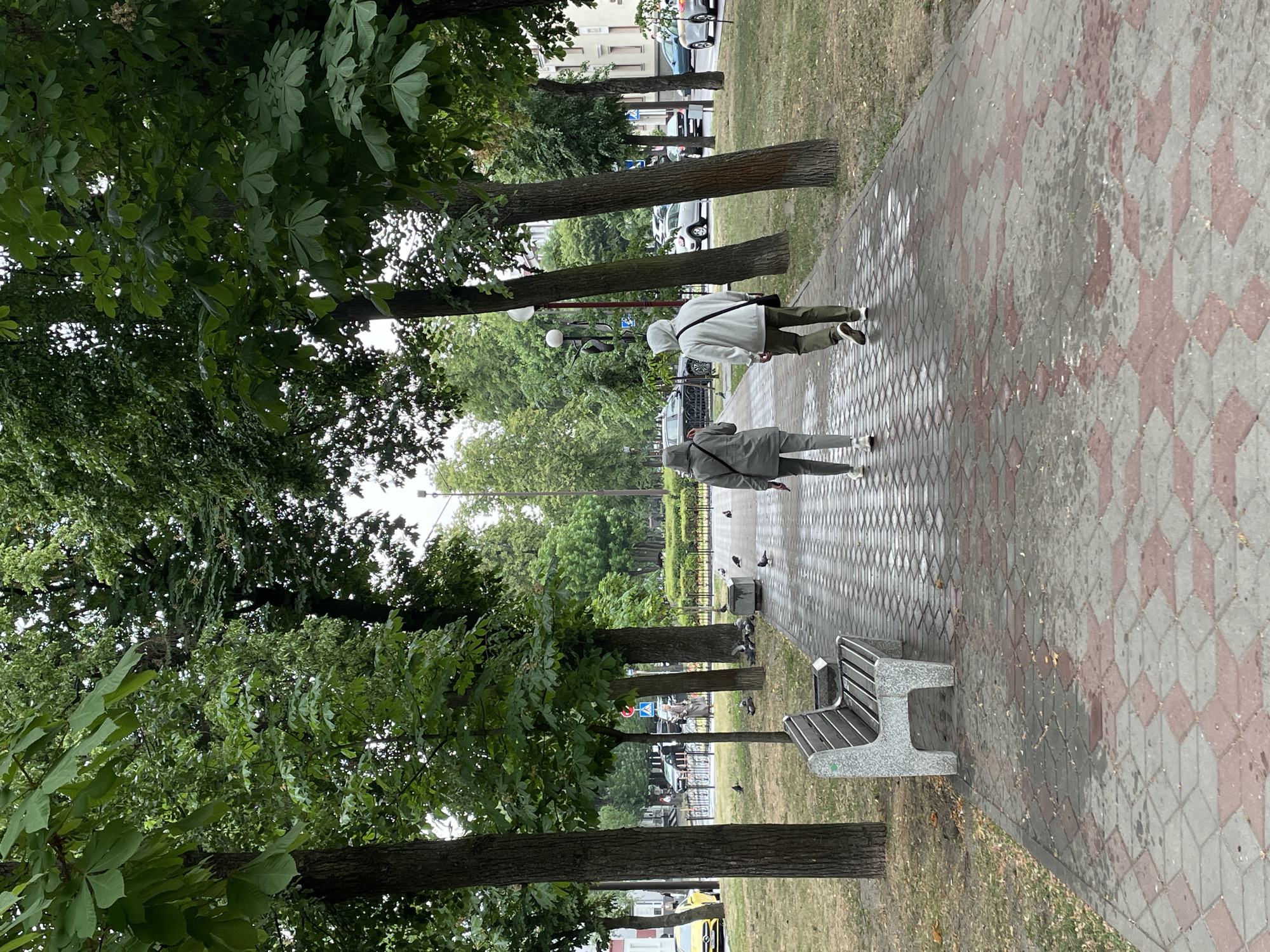 Afternoon stroll captured along sculptured pedestrian boulevard in Brest