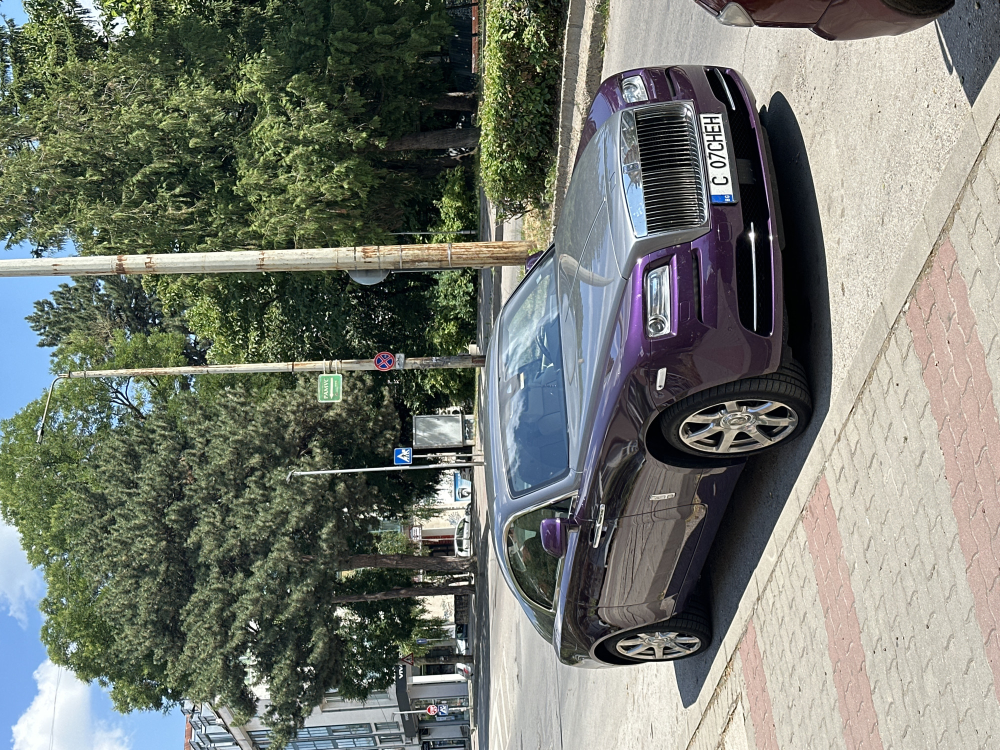 Purple Rolls-Royce Wraith parked on a Veliko Tarnovo street