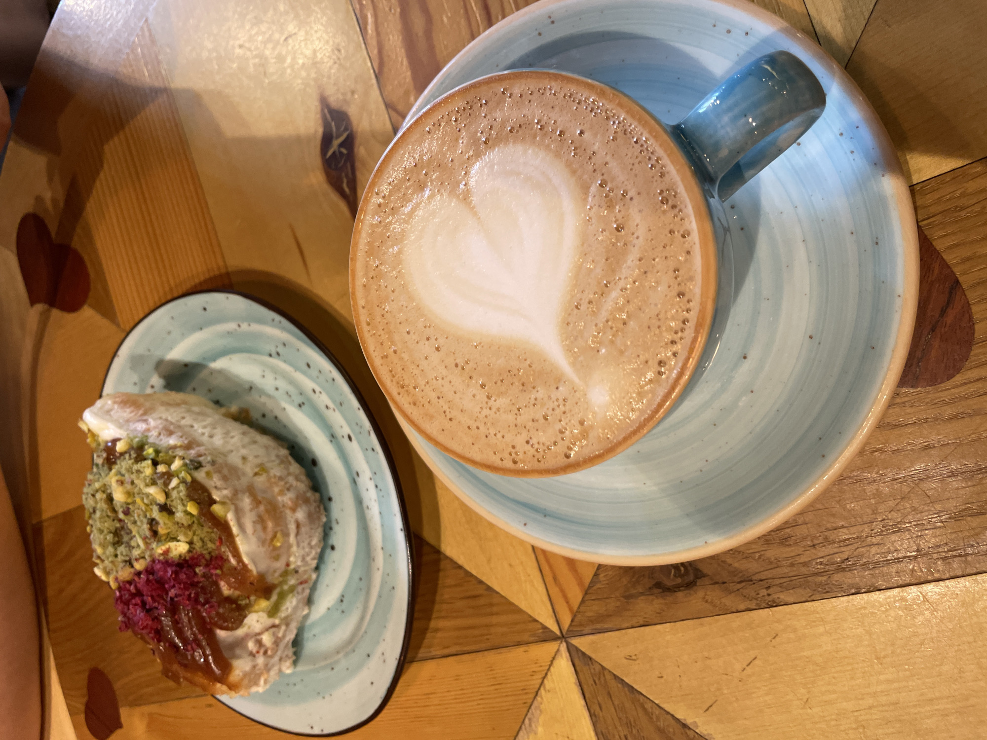 Morning cafe visit documented in Krasnoyarsk bakery displays