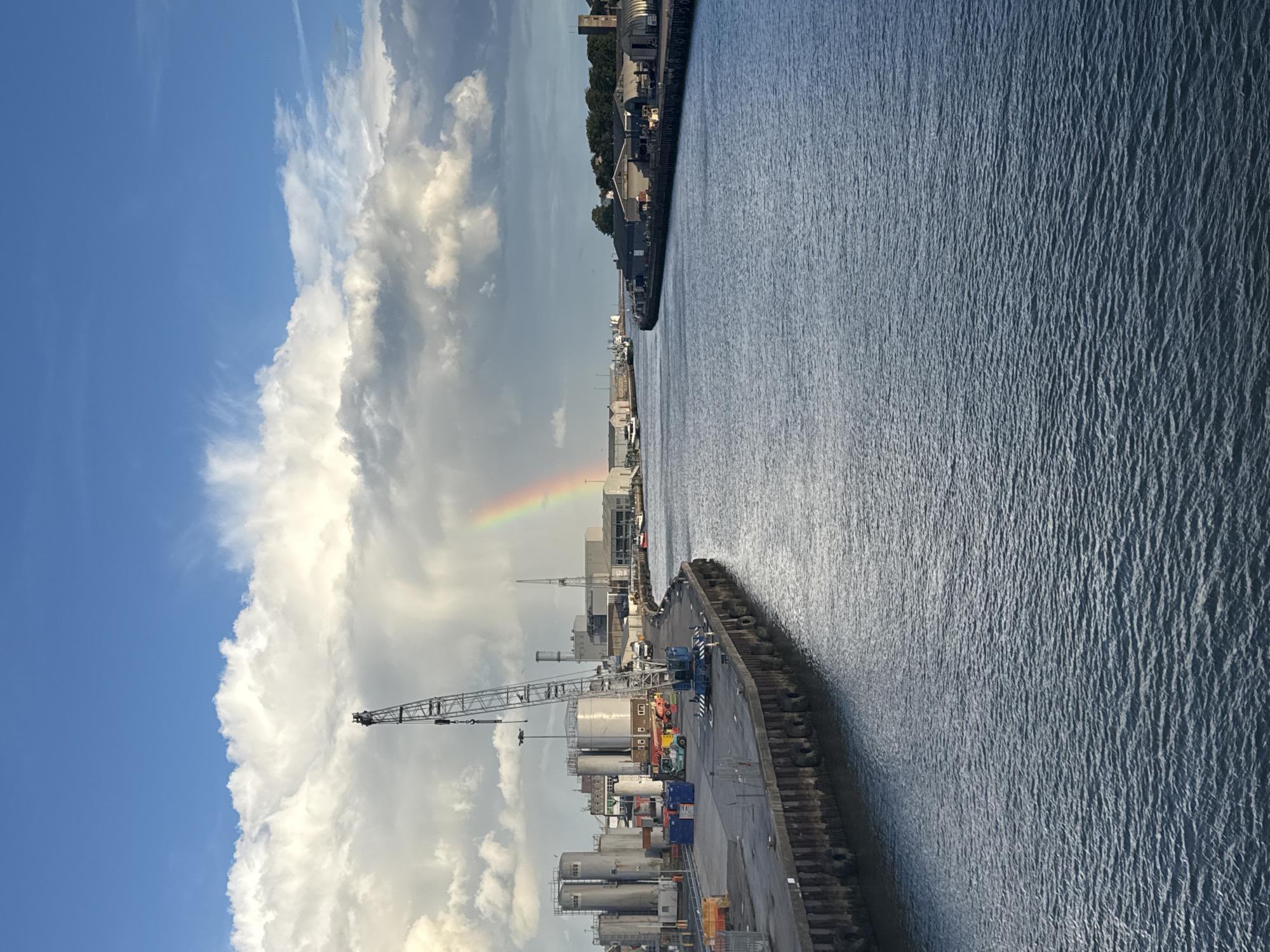 Evening bridge visit captures Great Yarmouth harbor views with rainbow