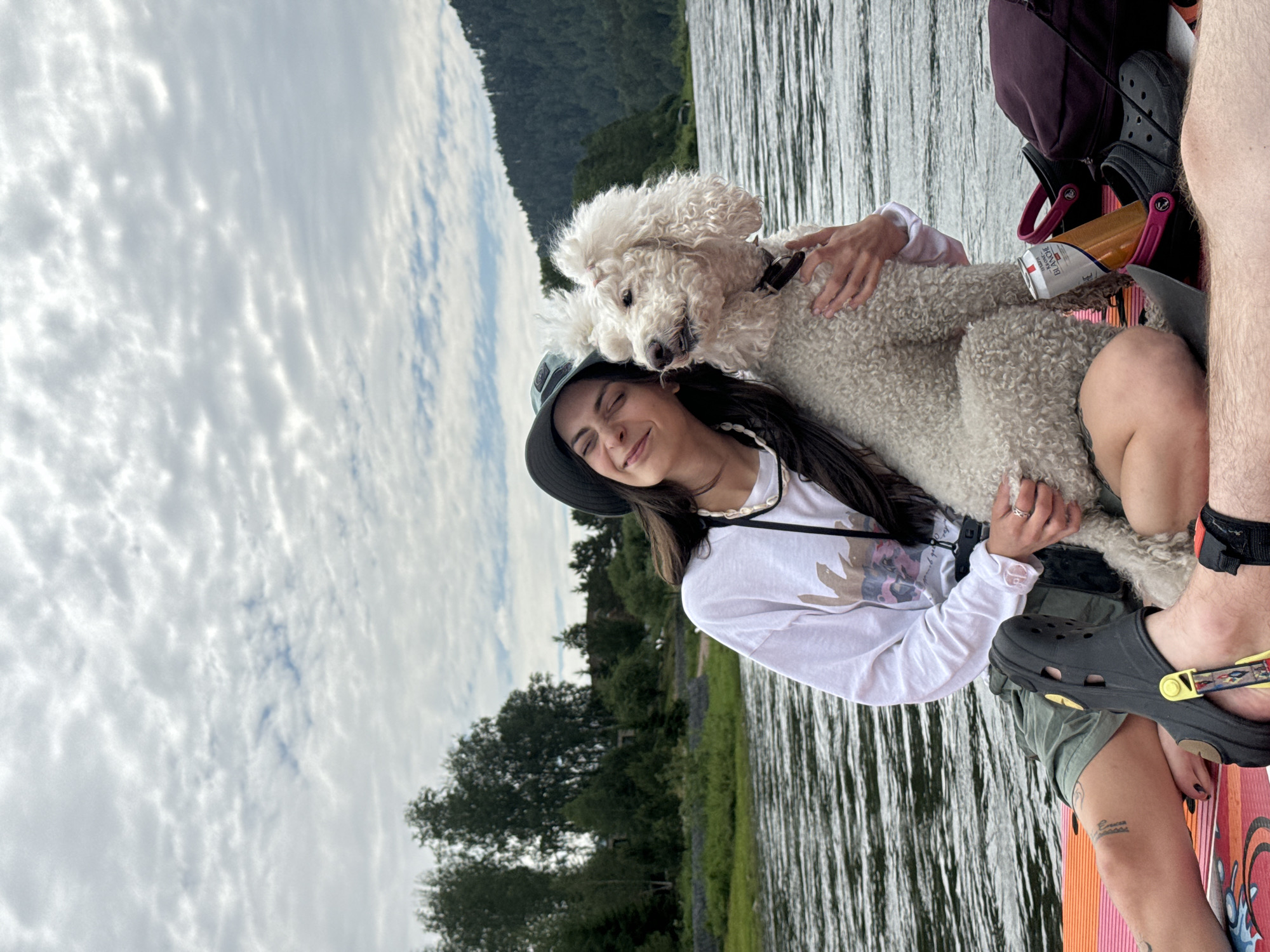 Paddleboarding with a poodle on a Russian river