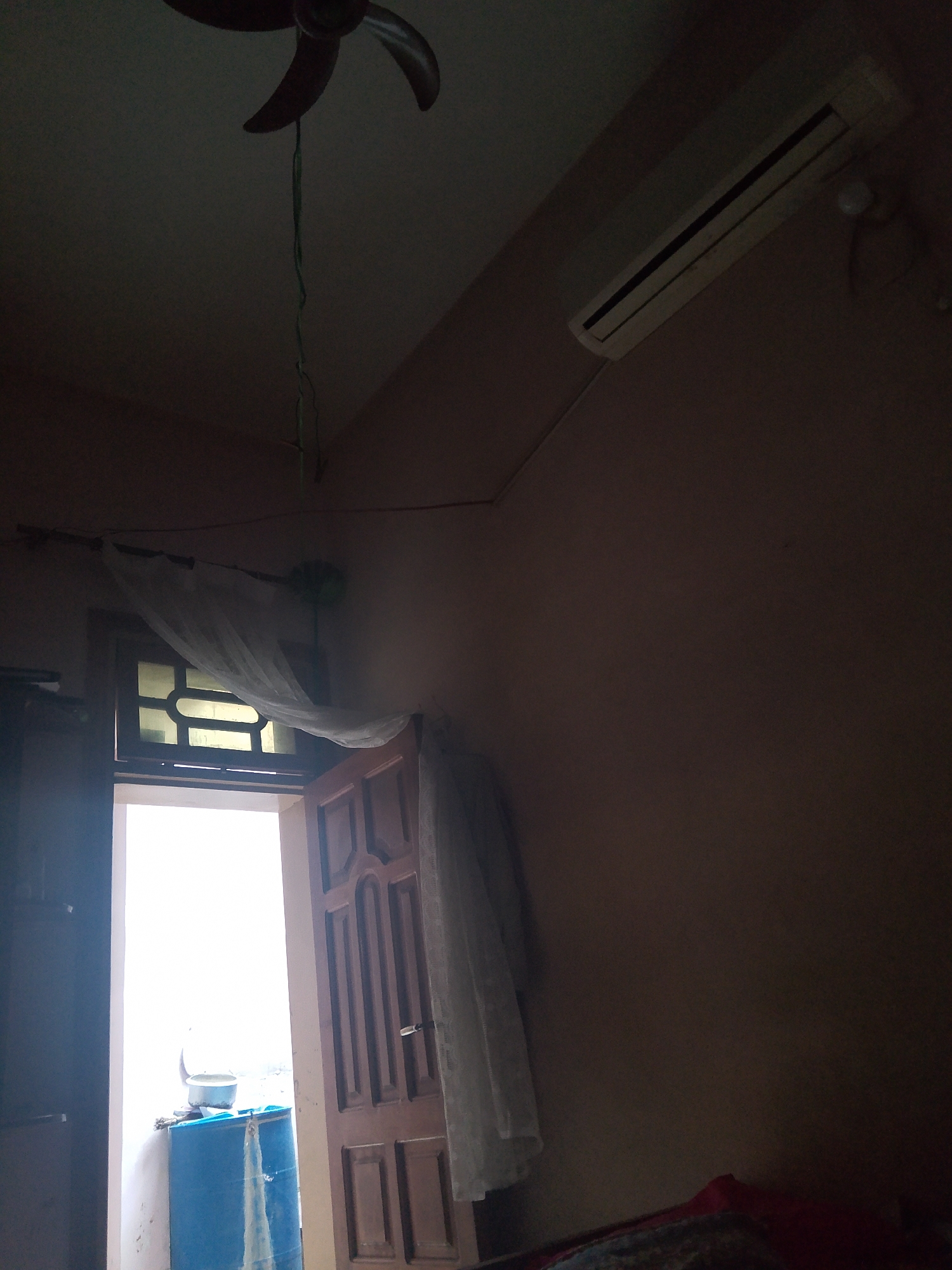 Interior room with ceiling fans and AC unit