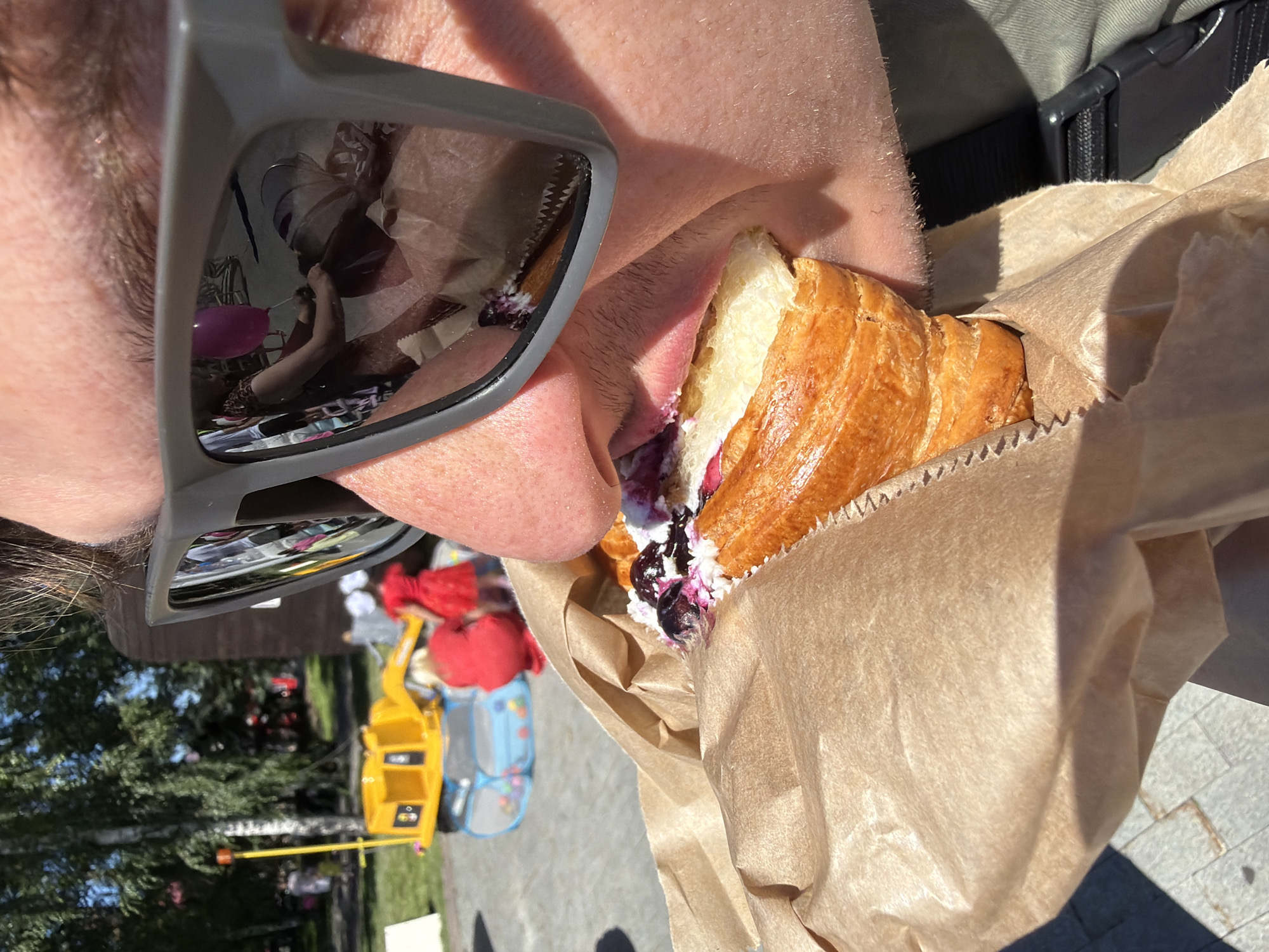 Sunny morning at a European-style square with an outdoor event