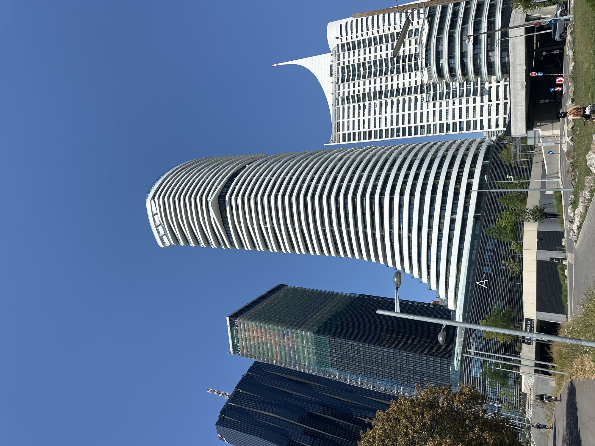 Vienna's modern skyline and Danube waterfront on a clear summer day