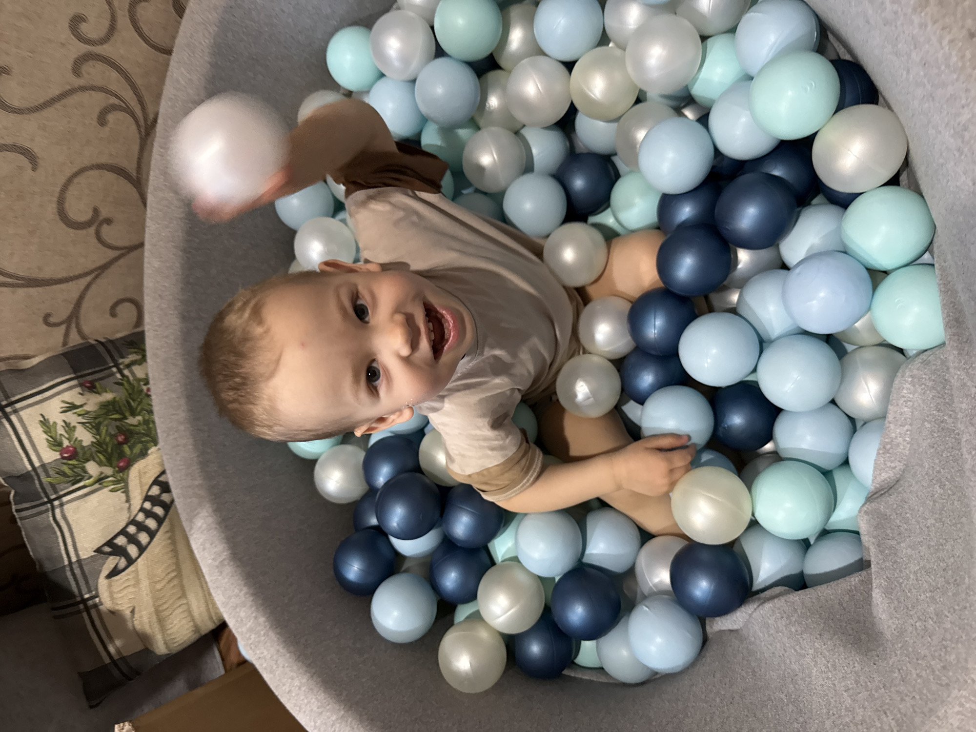 Child plays in indoor play area in Rusanovo