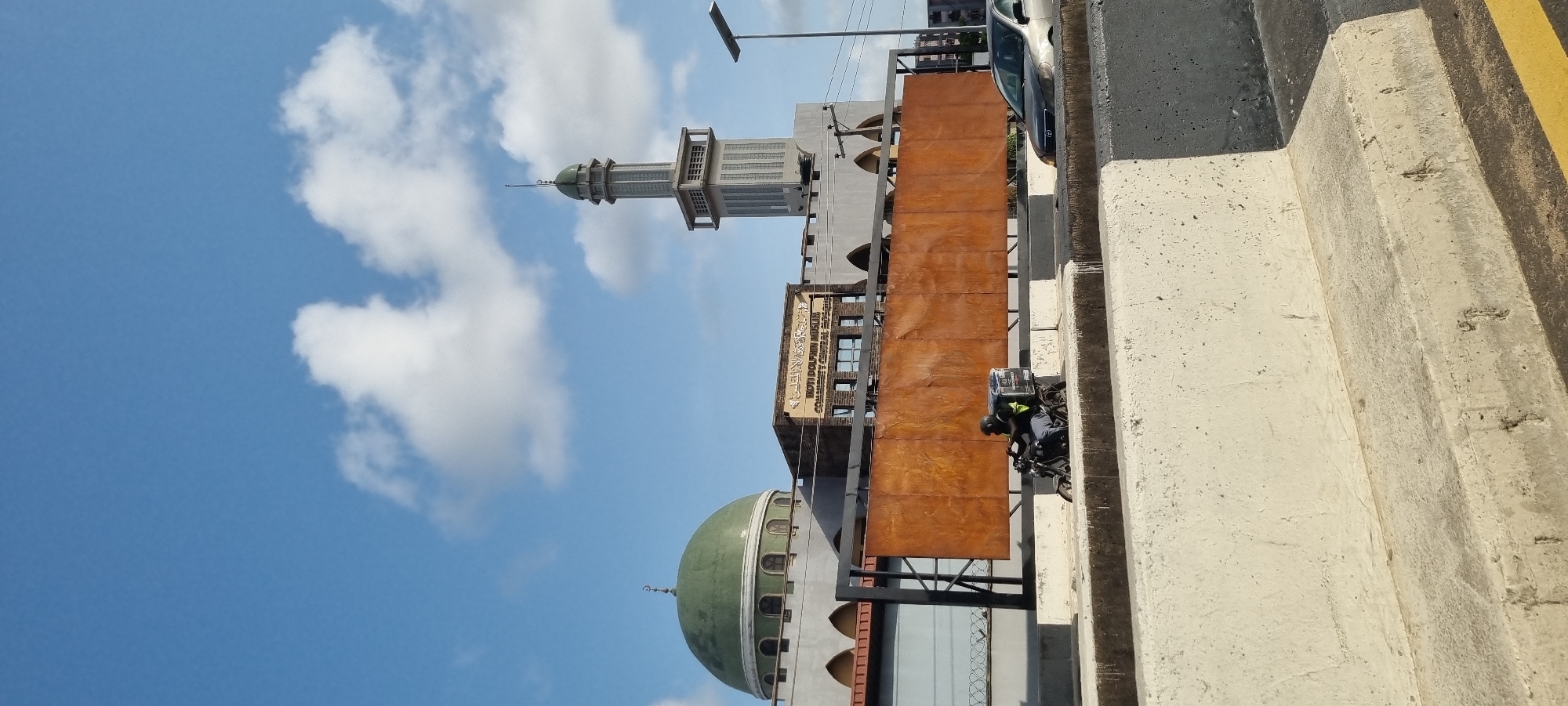 Falomo Central Mosque photographed against cloudy sky in Nigeria