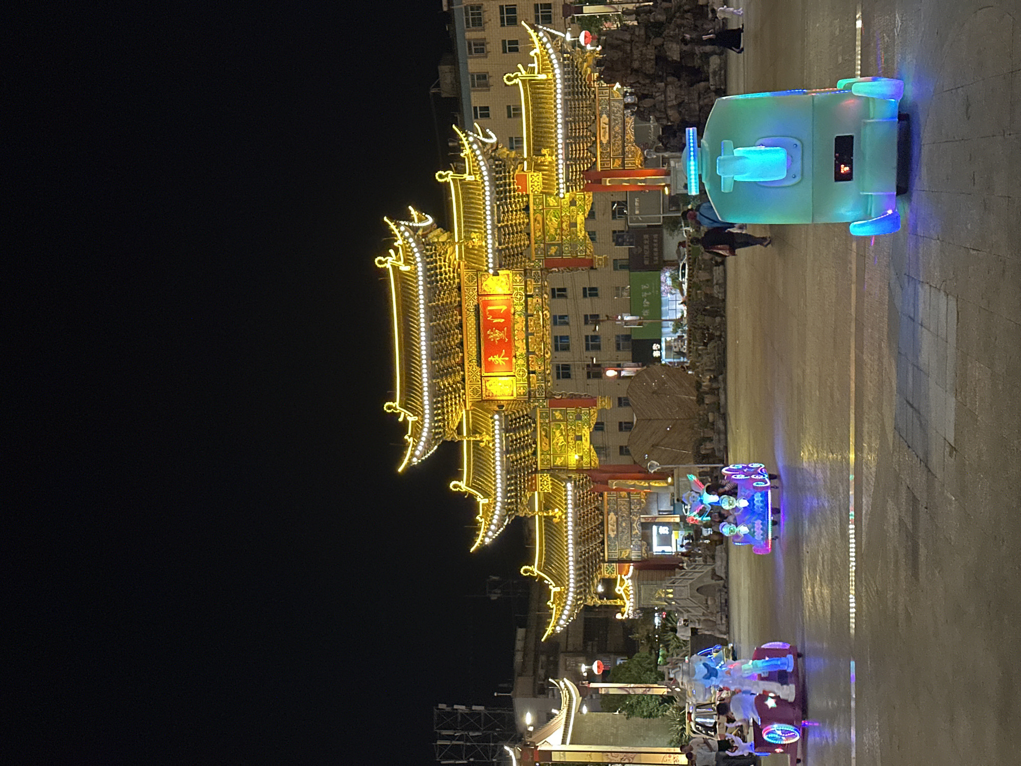 Evening documentation of illuminated traditional architecture in Eshan County