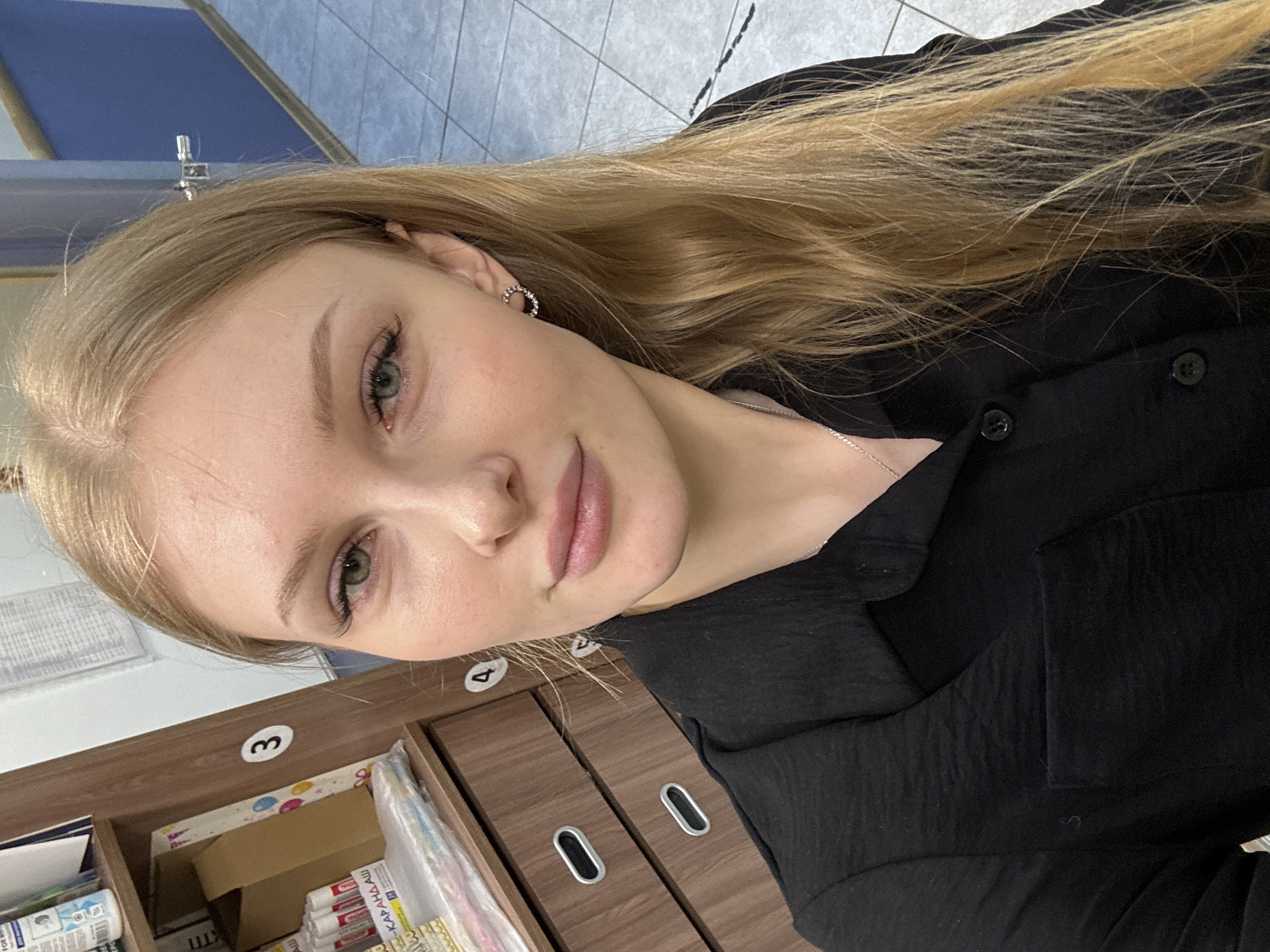 Woman takes selfies in Perm, Russia indoor location