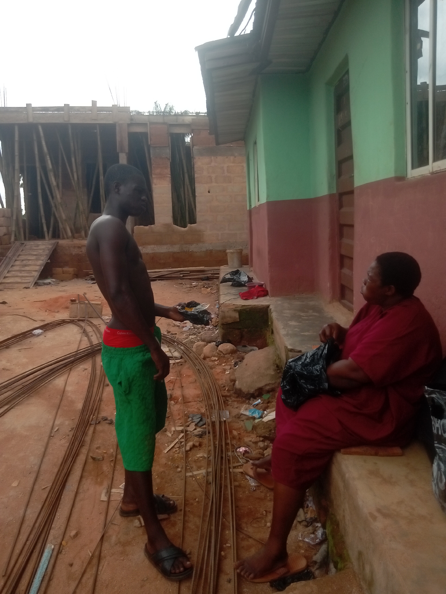 Man with green shorts observed at construction site in Ihiala