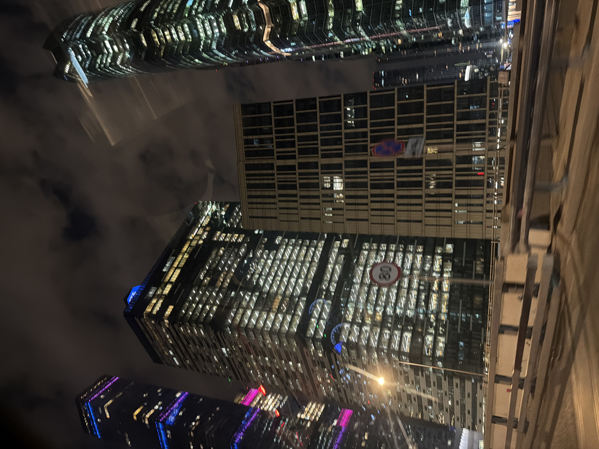 Moscow City skyscrapers illuminated during evening hours