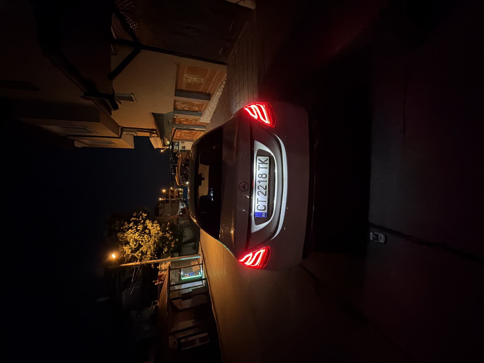 Evening scenes documented in Stara Zagora: parked car, indoor gaming