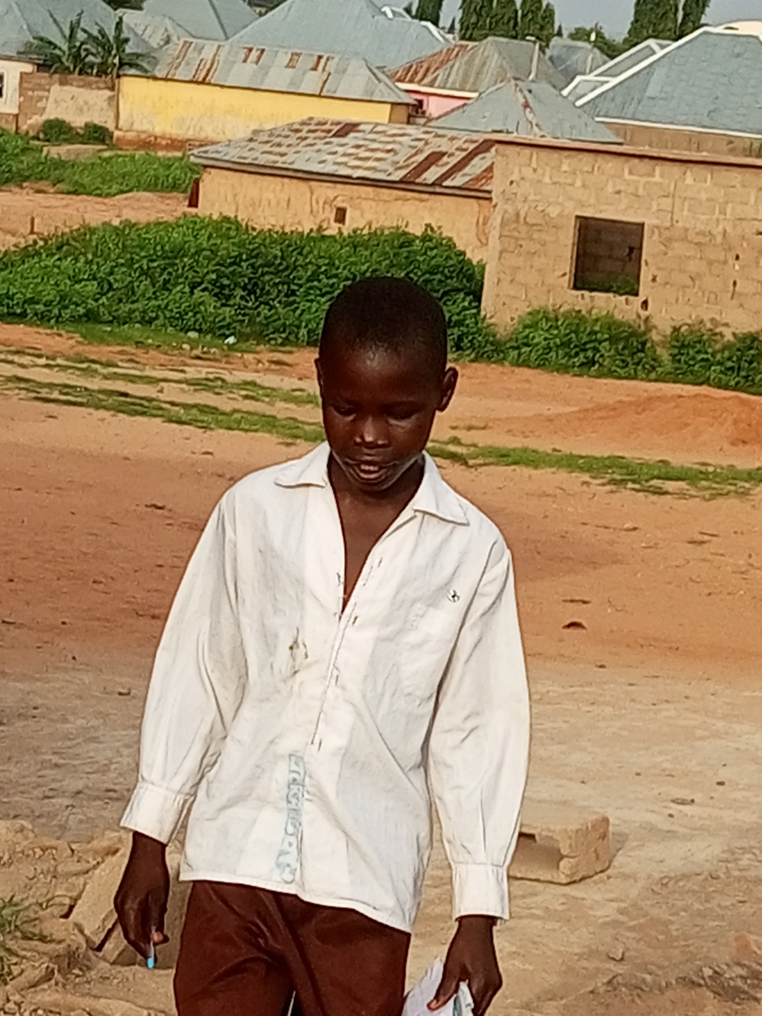 Morning foot traffic and daily routines in Tumfure, Nigeria