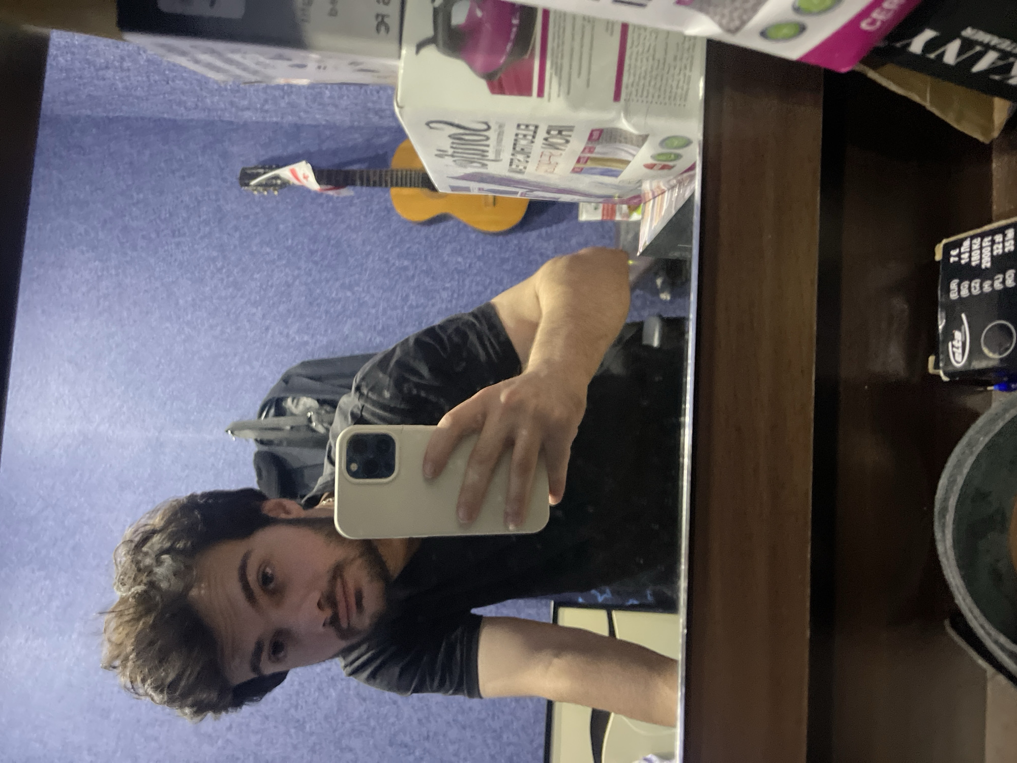 Young programmer documents coding session with selfies in Tbilisi