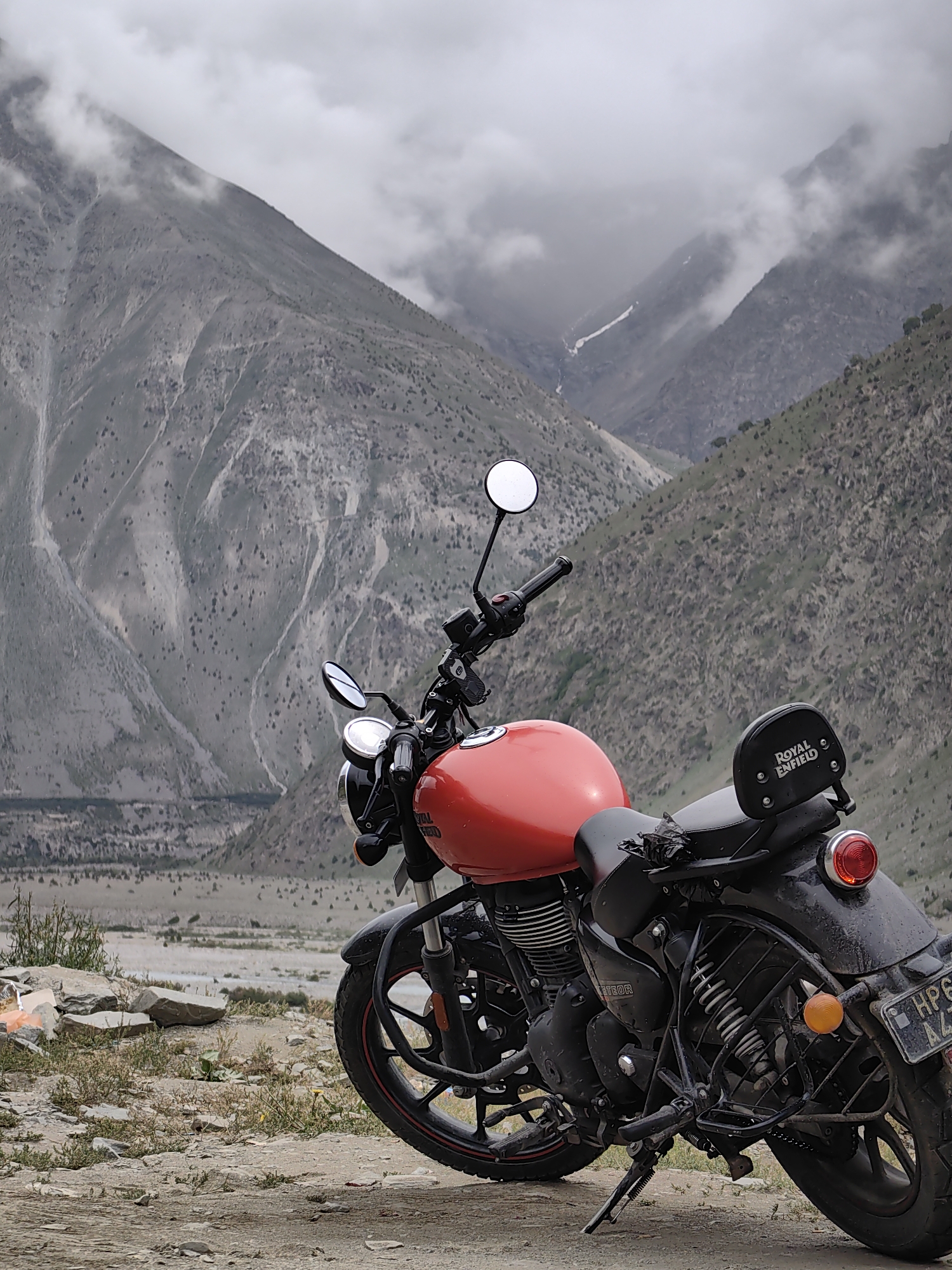 Roadside stop in Darcha: braided river, high ridges, Royal Enfield