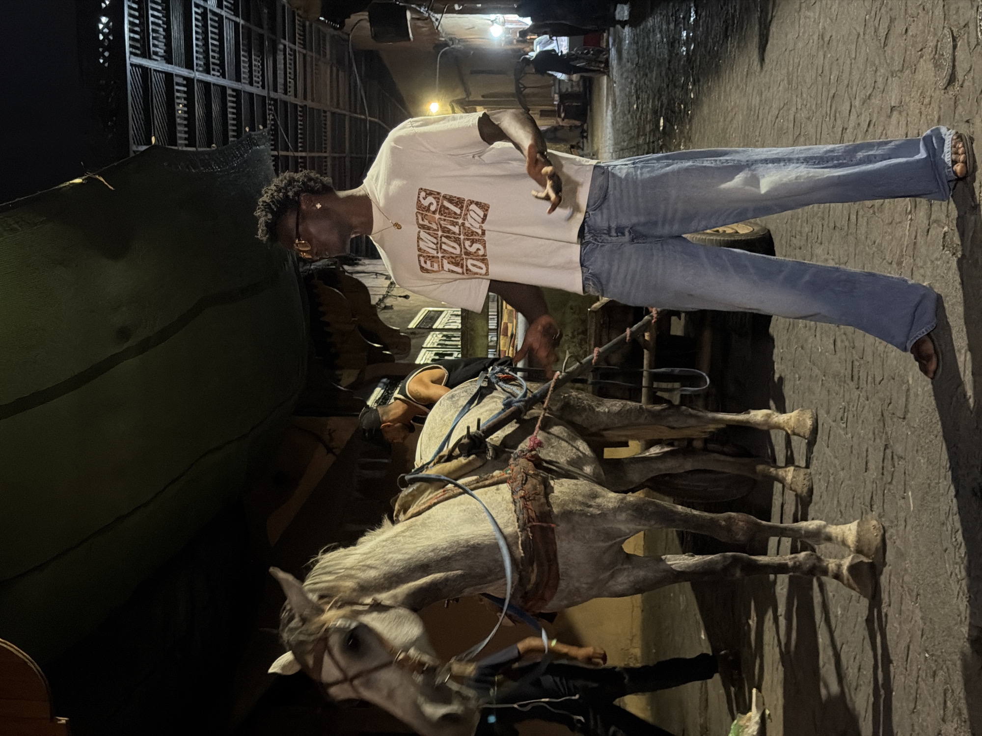 Night market buzz in Marrakesh's medina — grills, fruit stalls, cobblestones