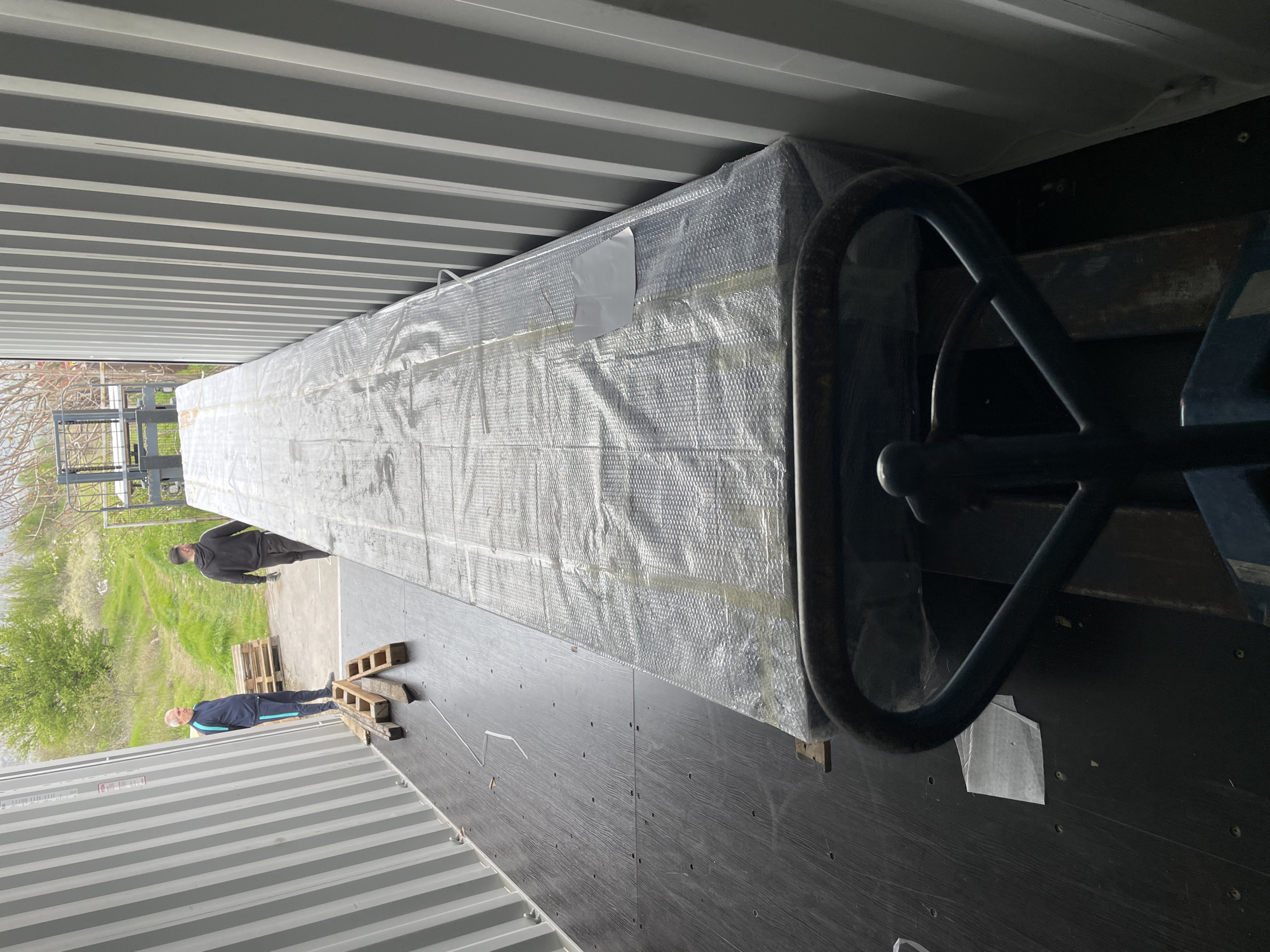 Shipping container loading operations documented in Asenovgrad, Bulgaria