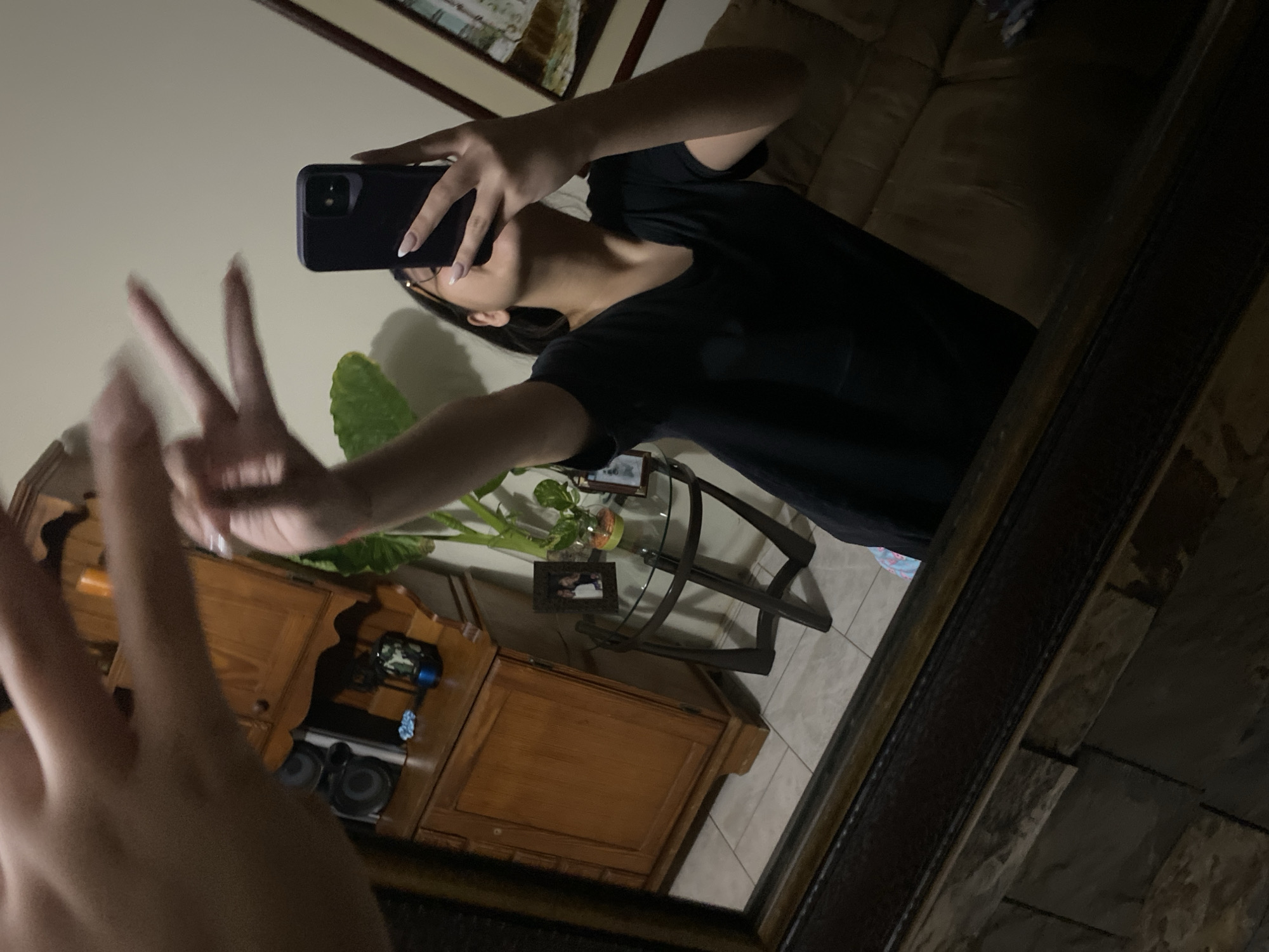 Late-night casual photography session documented in Venezuelan home