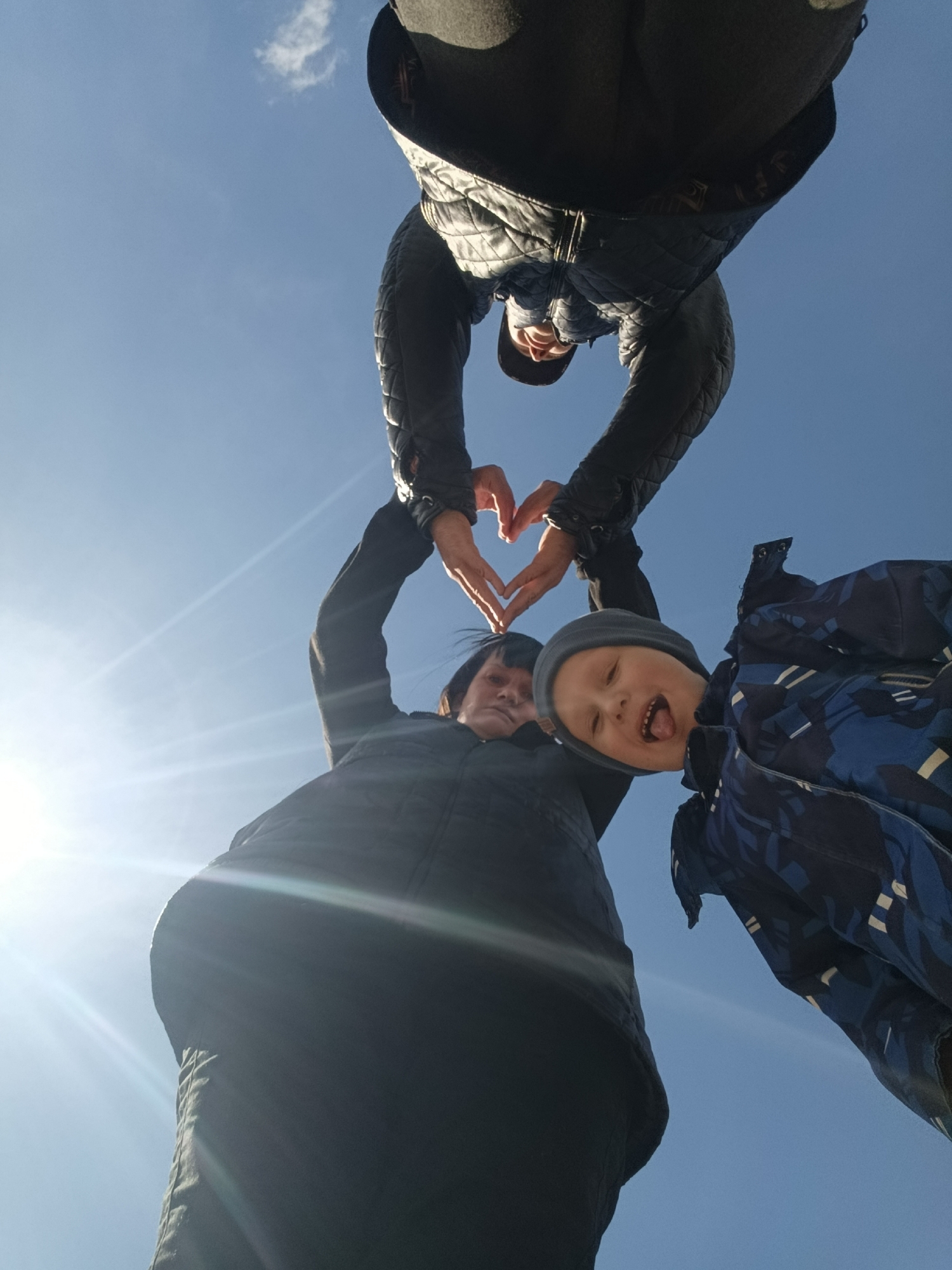 Three people photographed against sky in Фоки, Russia