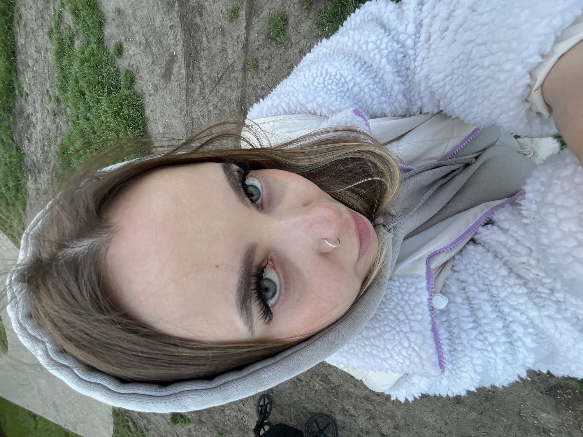 Friends photograph each other during riverside outing in Krasnodar