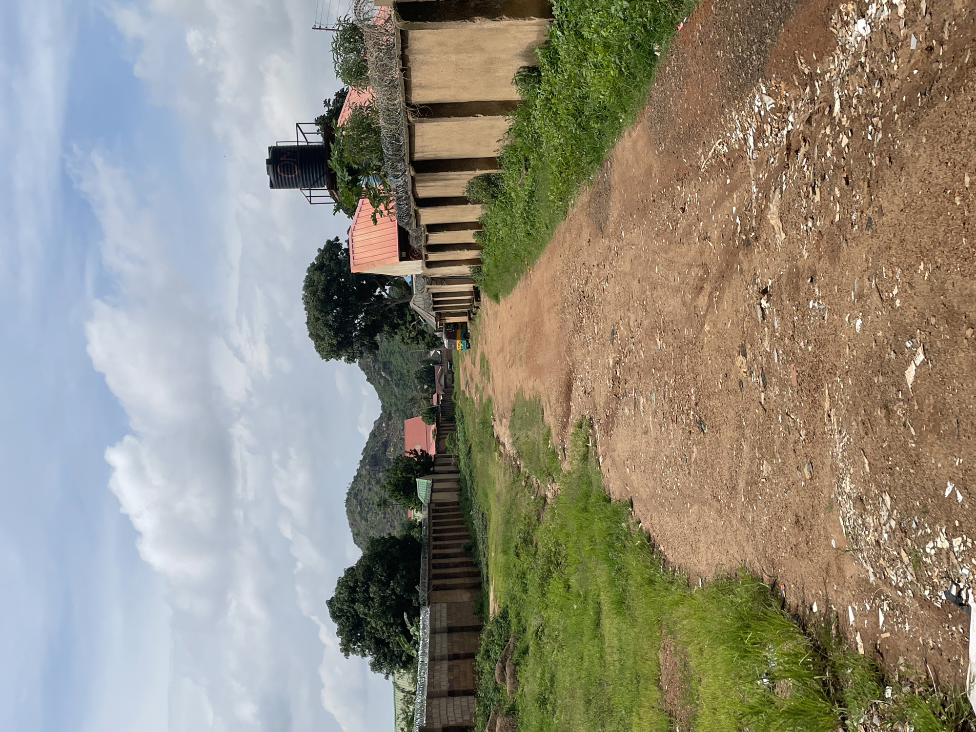 Street life and cash exchange in a Jos residential neighborhood