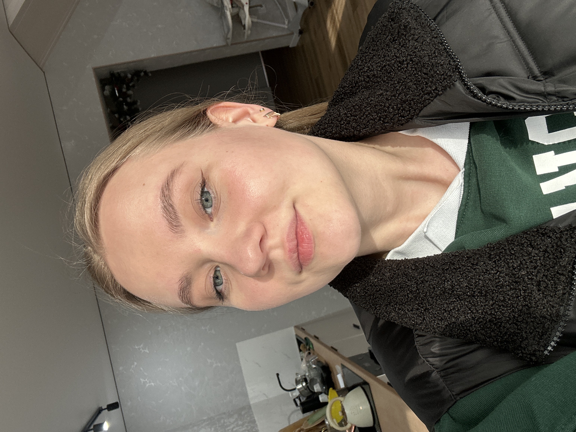 Casual selfies and cat photos captured in Chaikovsky apartment