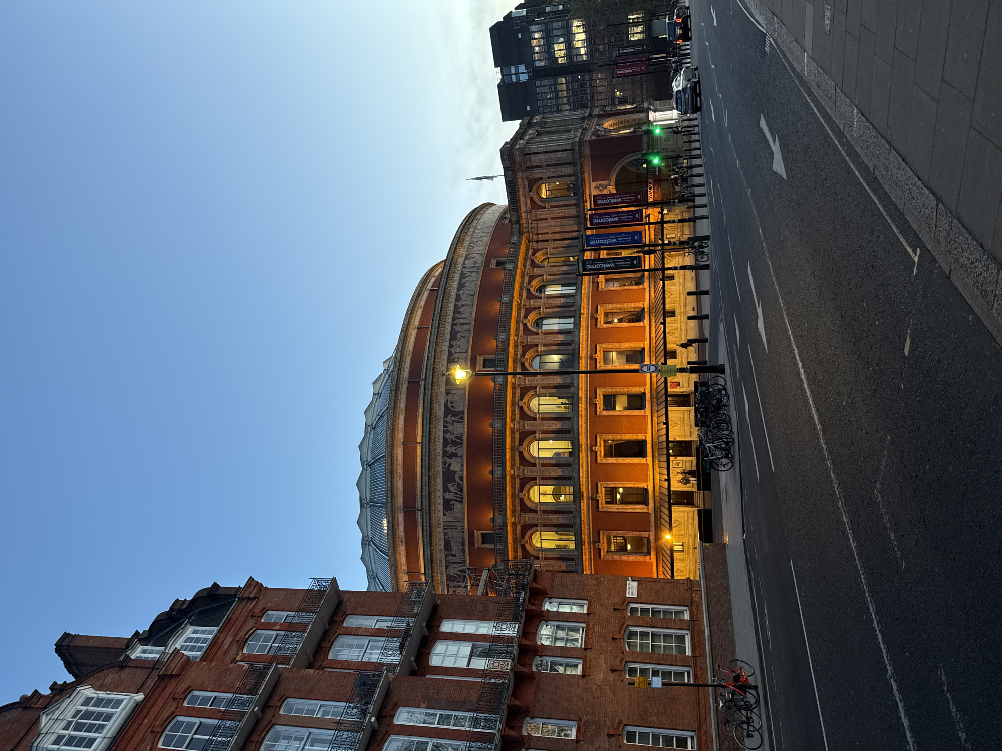 Evening street life documented near Royal Albert Hall