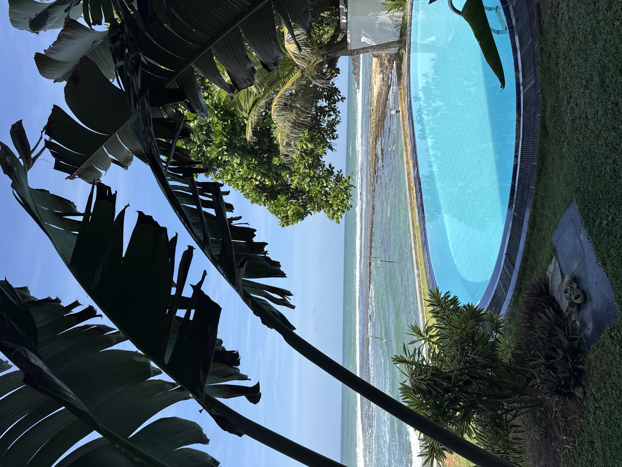Poolside and coastal scenes at a Sri Lankan beach resort