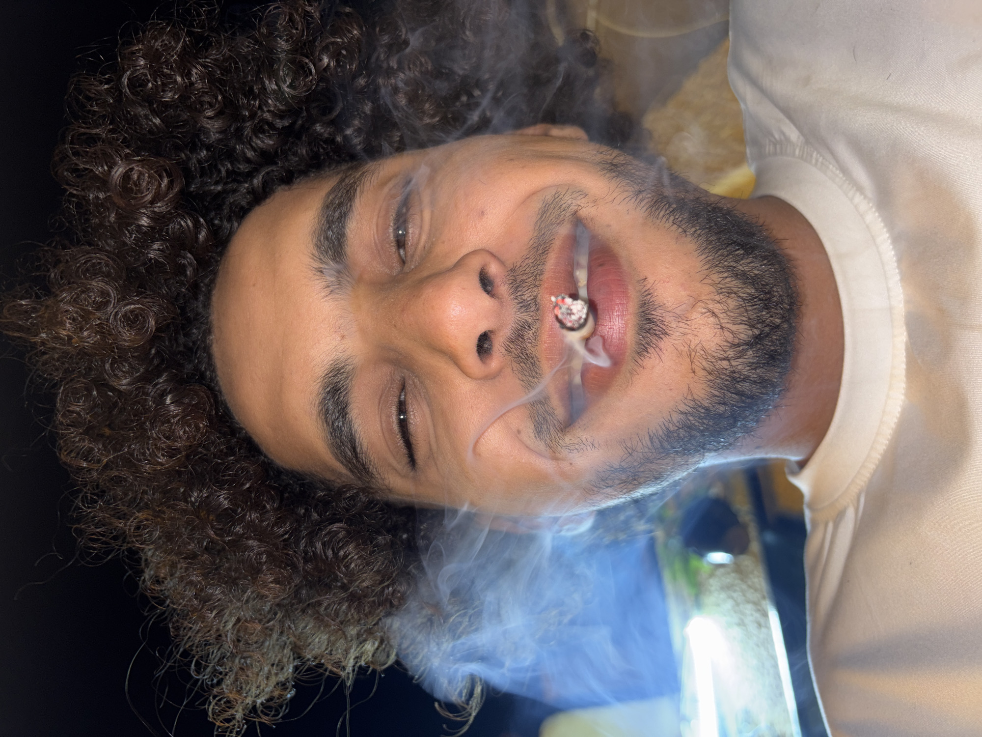 Young man photographed smoking cigarette in Tangier, Morocco