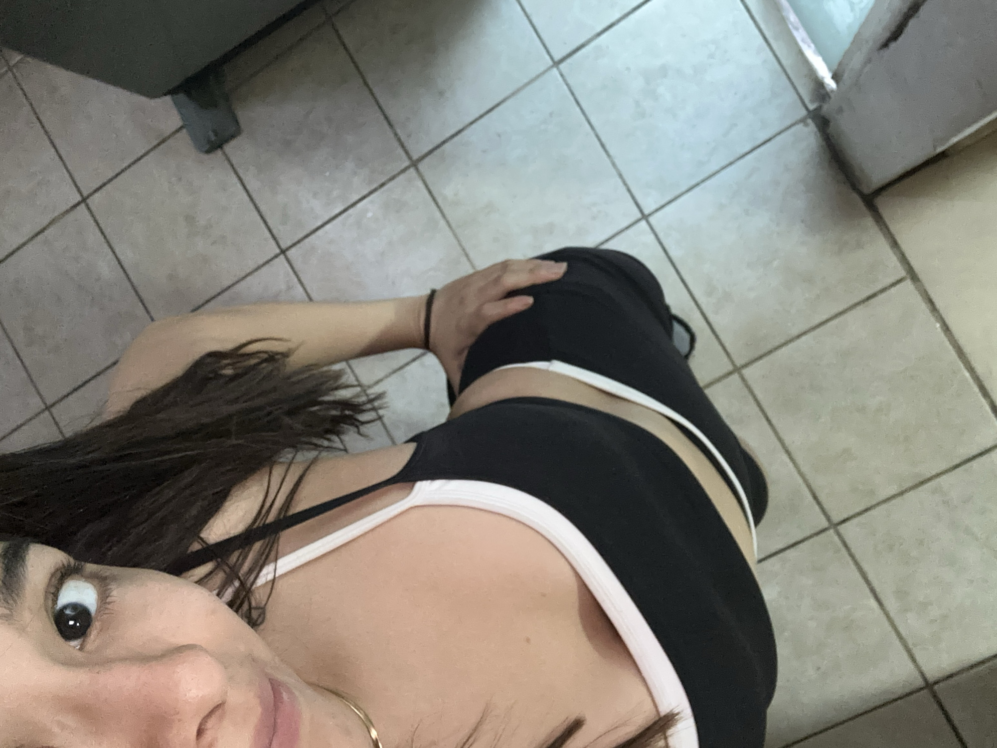 Woman photographed in casual poses in Puebla kitchen