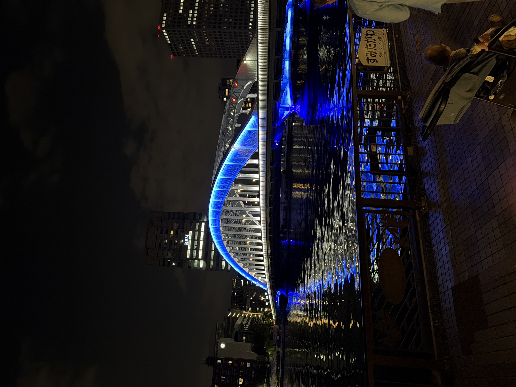 Blue-lit Kiyosu Bridge illuminated over Sumida River, Tokyo
