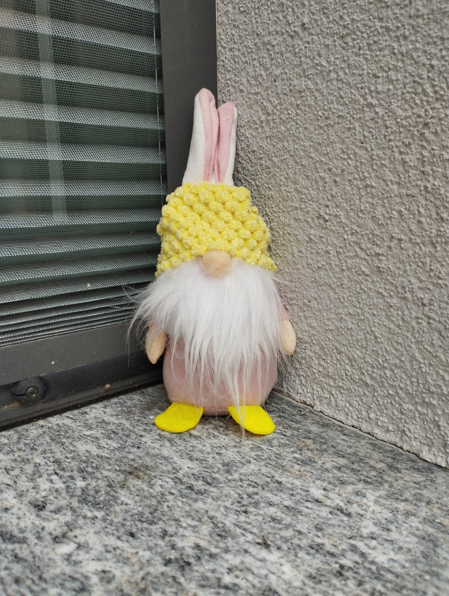 Casual street photography captures decorative items and parked car in Biasca