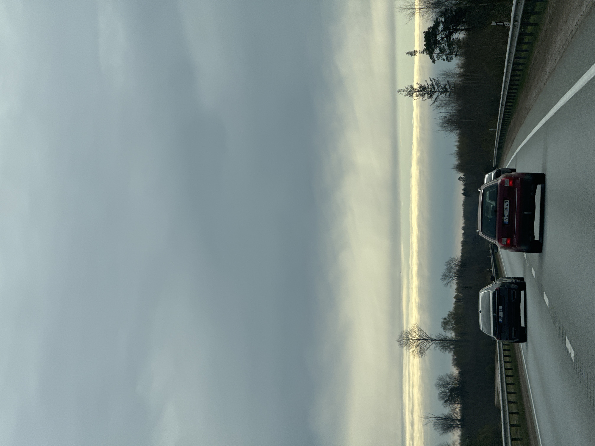 Two cars spotted on Latvian highway, license UP-66 noted