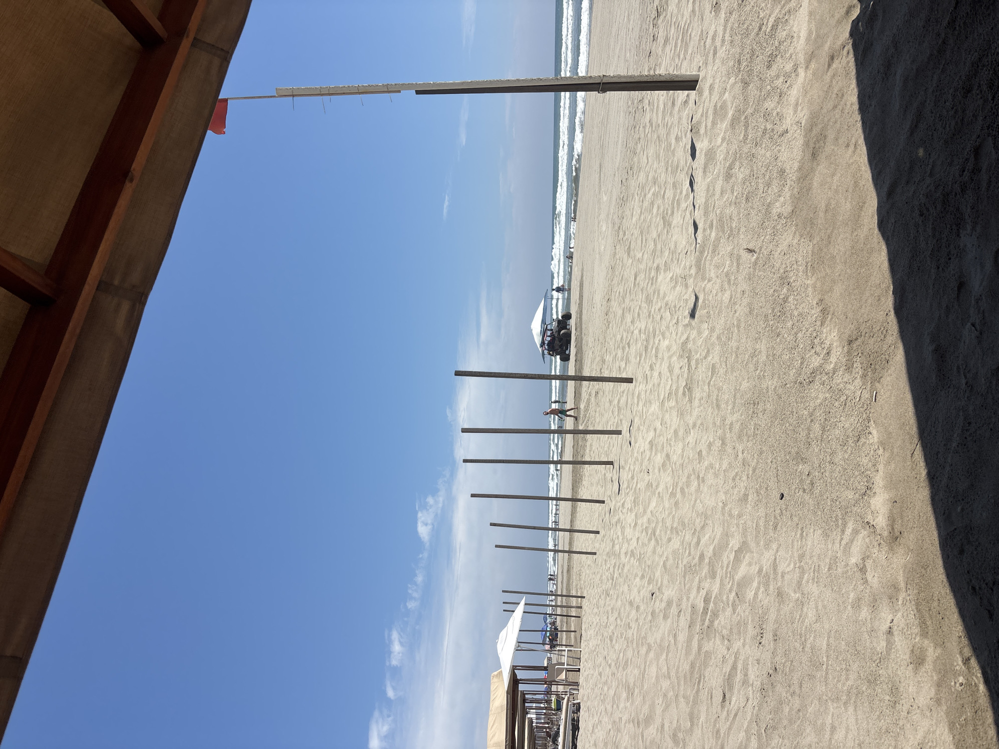 Beach day activities captured in Acapulco including backgammon game