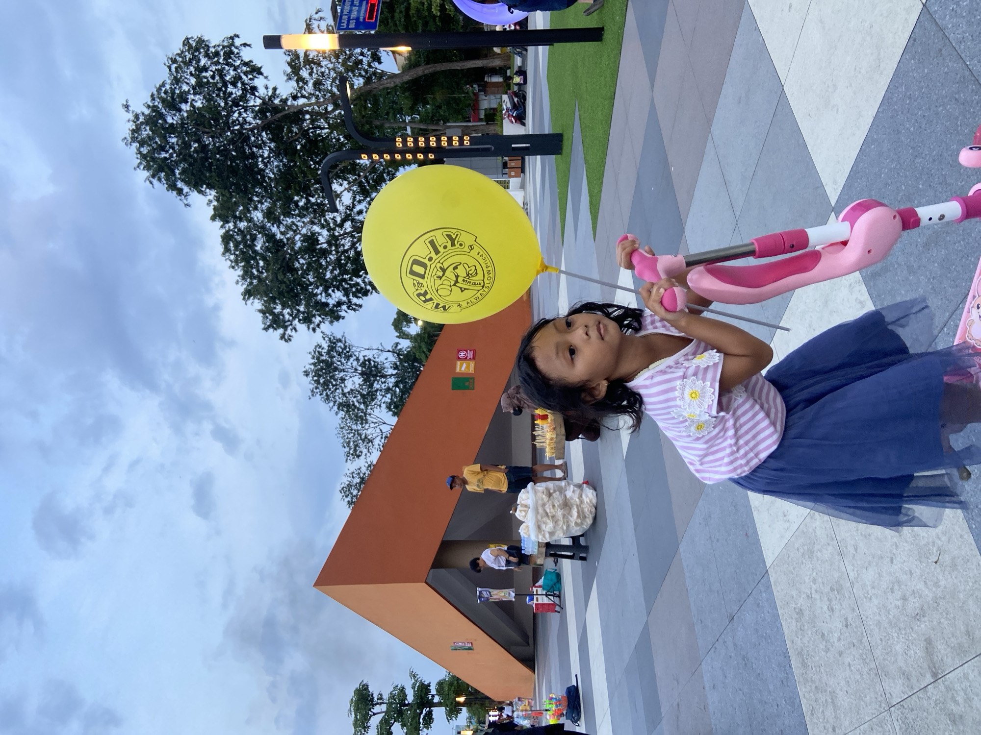 Everyday life captured at Sidoarjo public square during morning hours