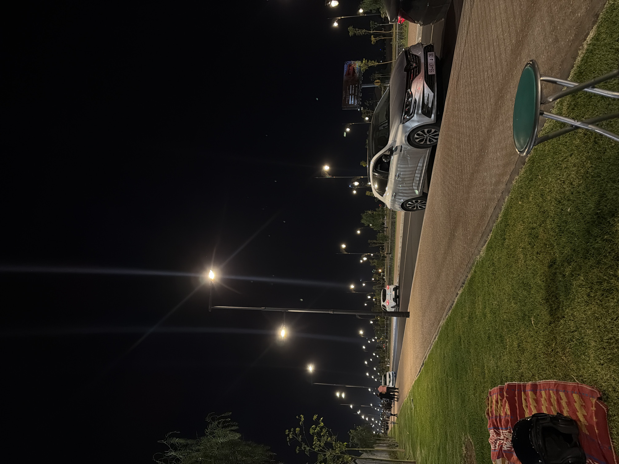 Nighttime street scene captured in Ouahat Sidi Brahim, Morocco