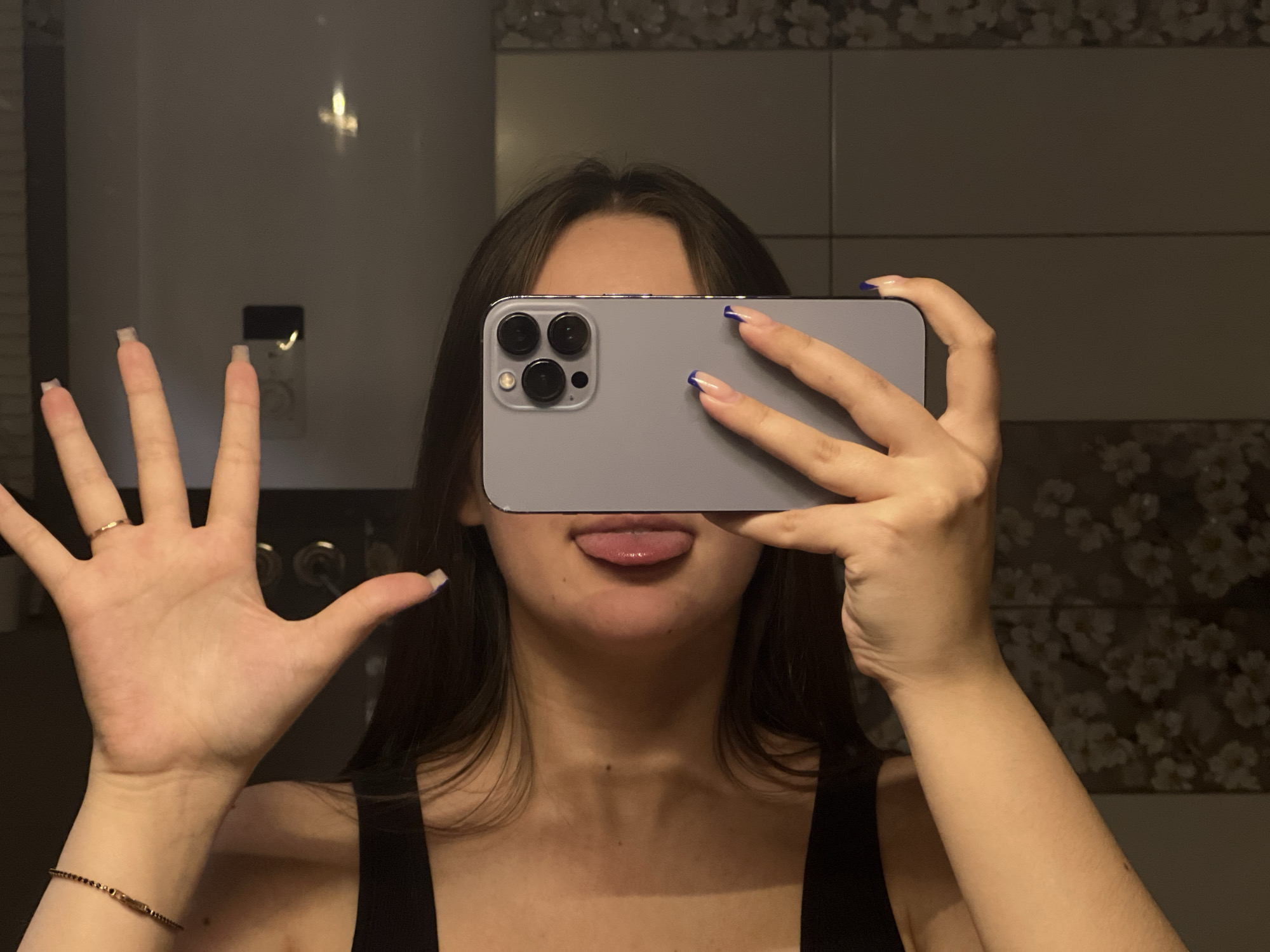 Nightclub selfies captured in Chaikovsky venue during evening hours