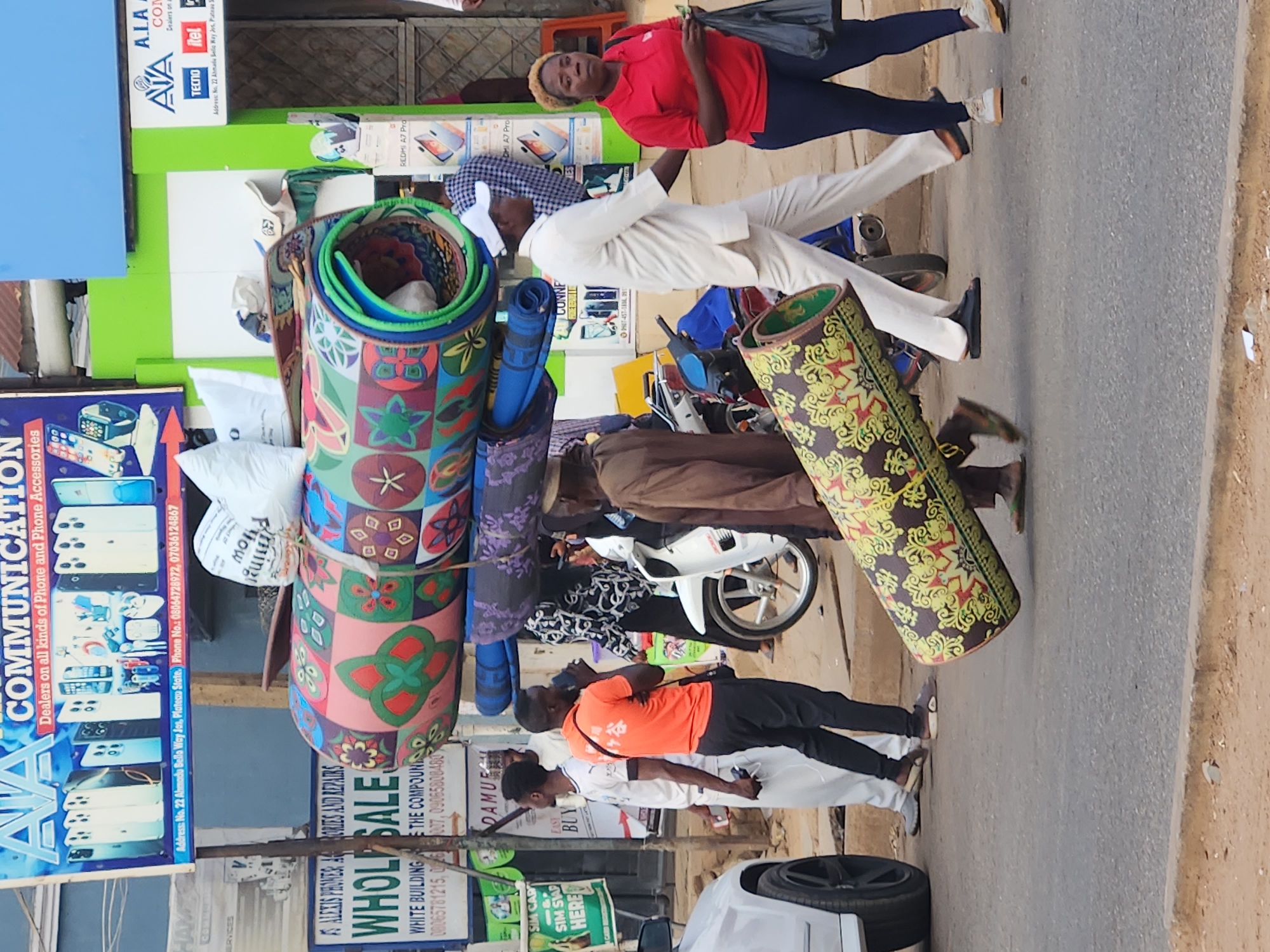 Daytime street life documented in Jos commercial district