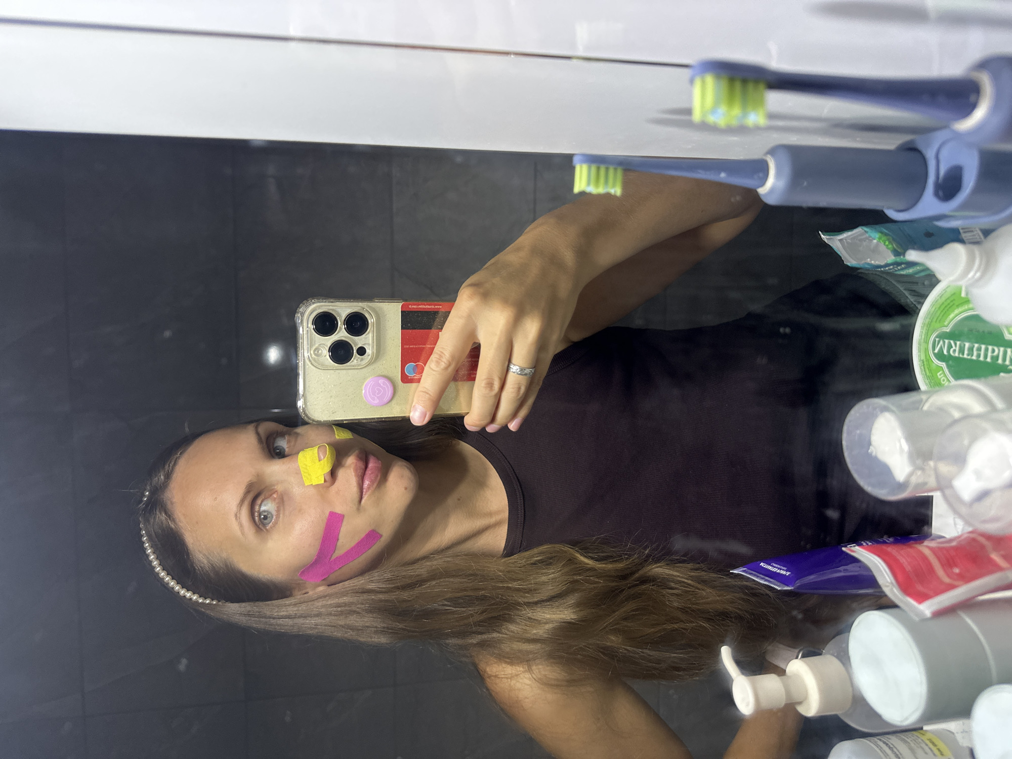 Facial taping and LED light therapy session in Fethiye bathroom