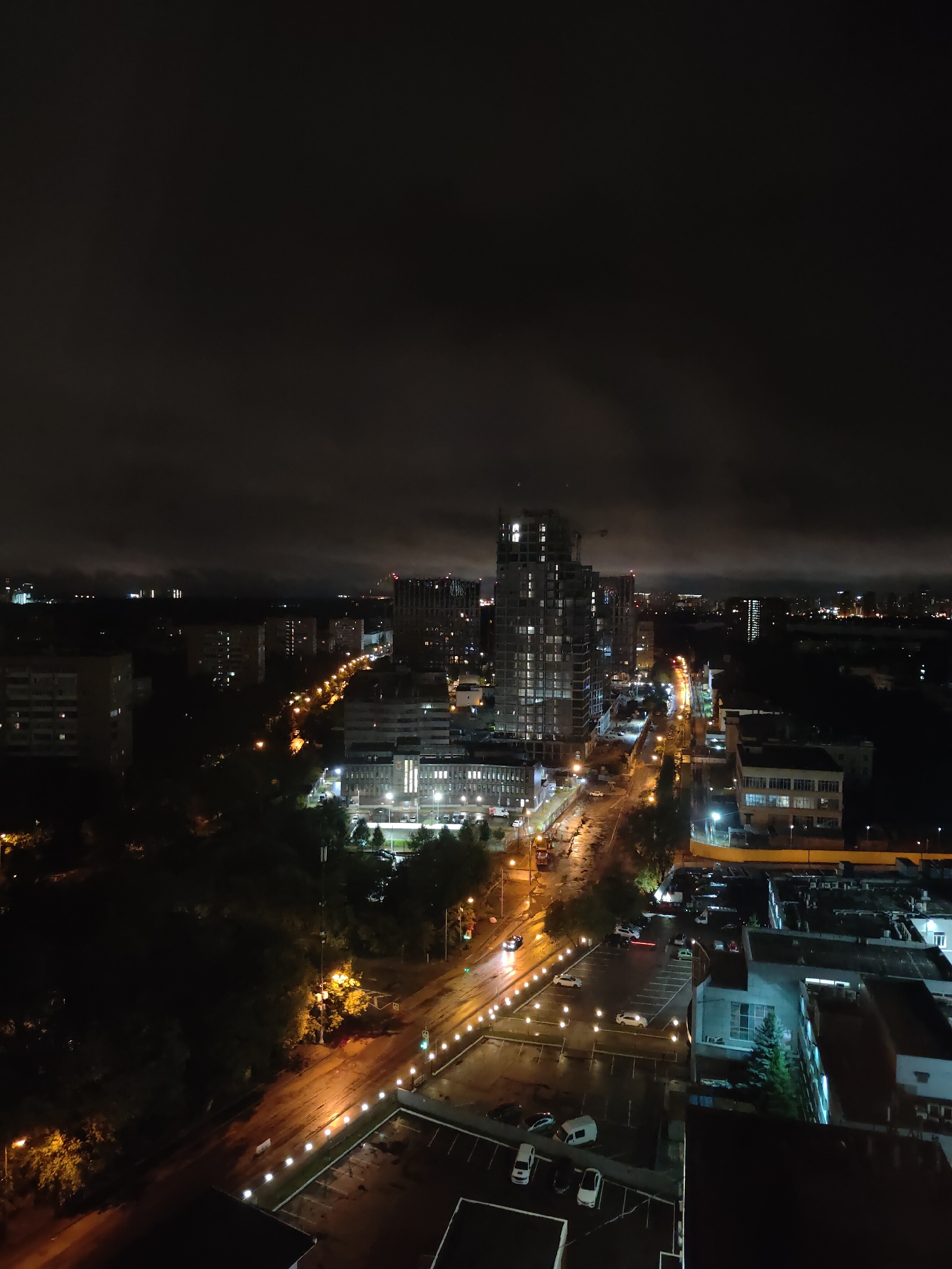 Moscow district lit up at night from above