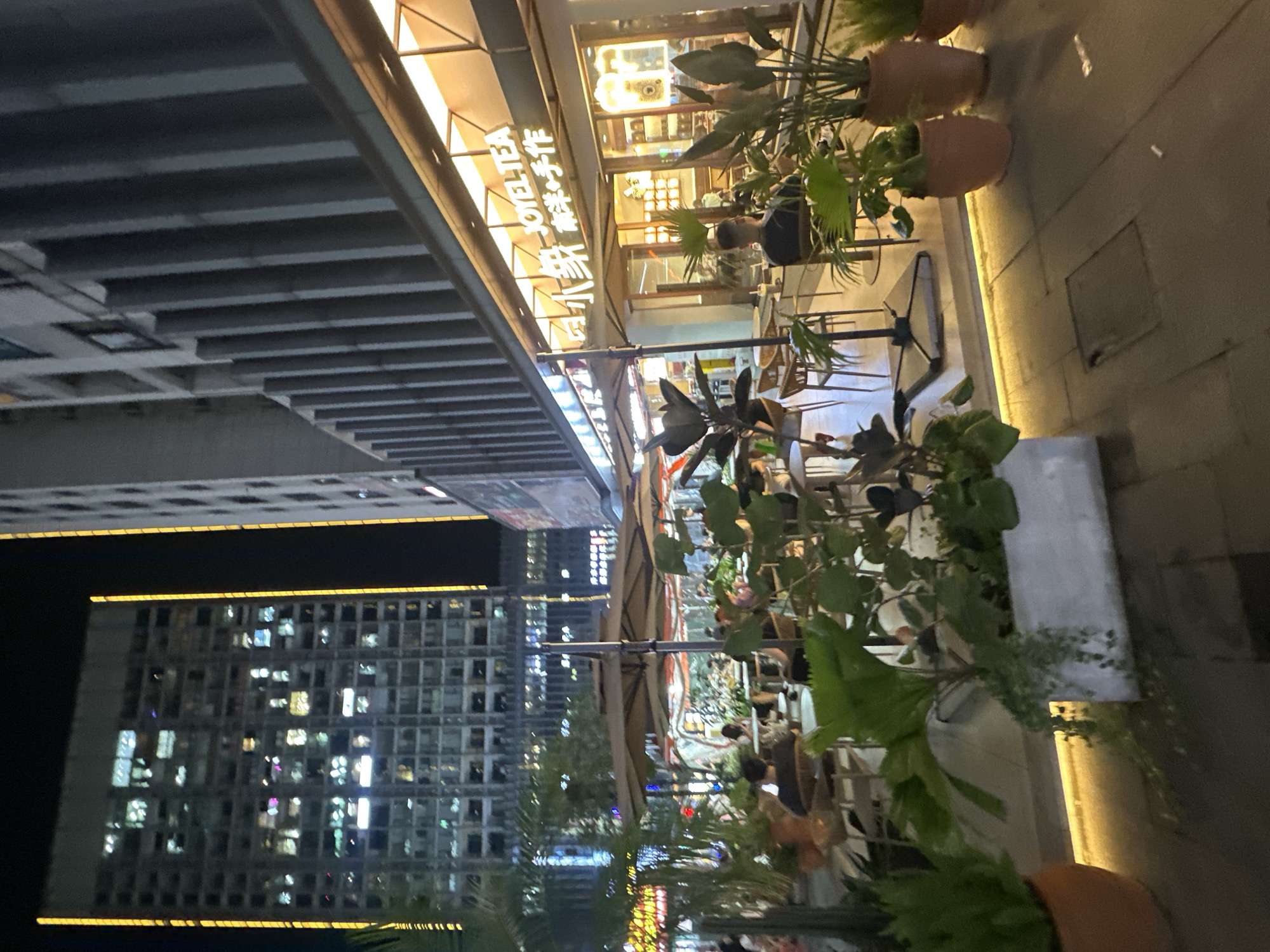 Chongqing High-tech Zone pedestrian district buzzes on a summer evening