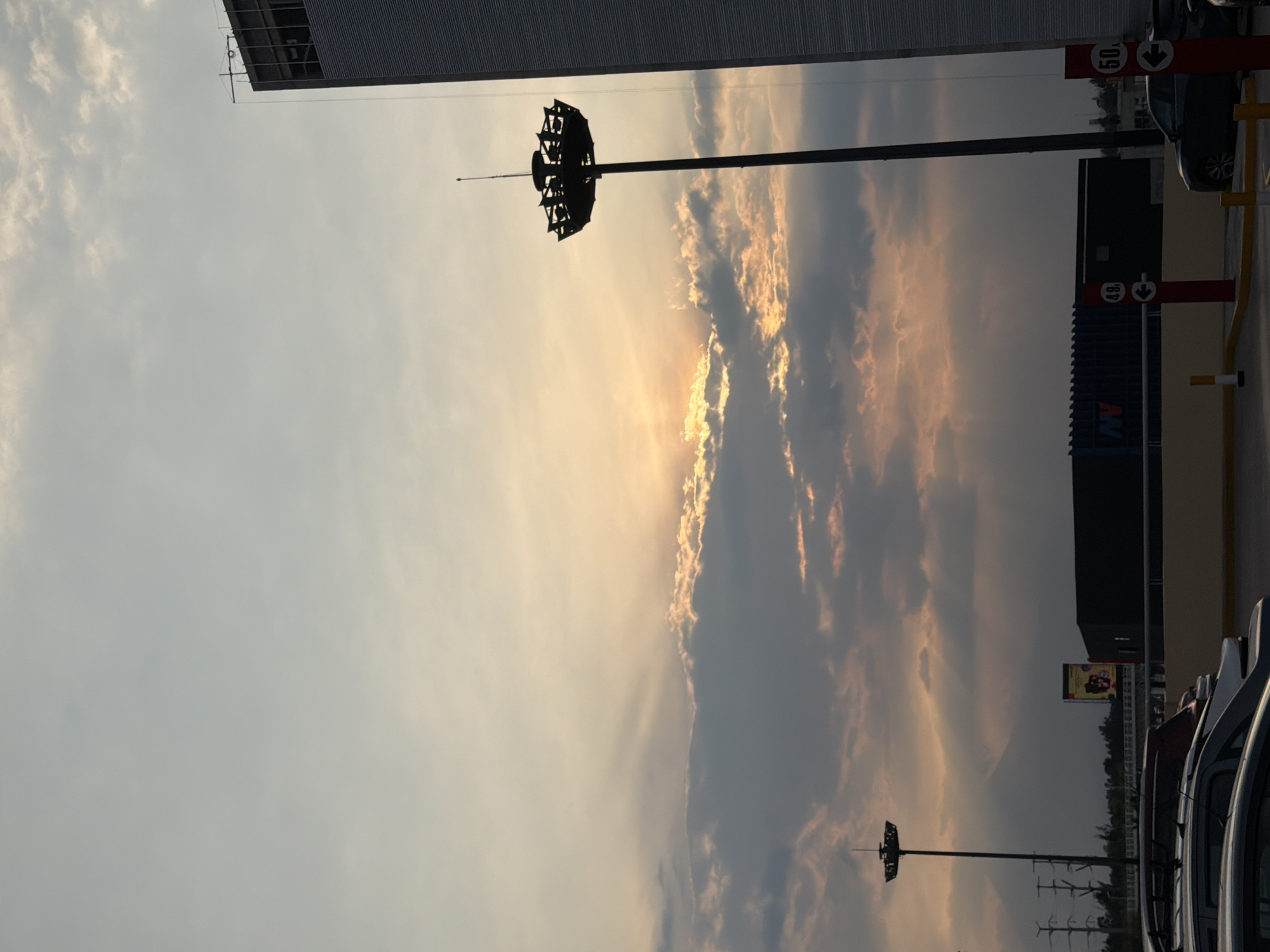 Dramatic sunset clouds observed in urban commercial area