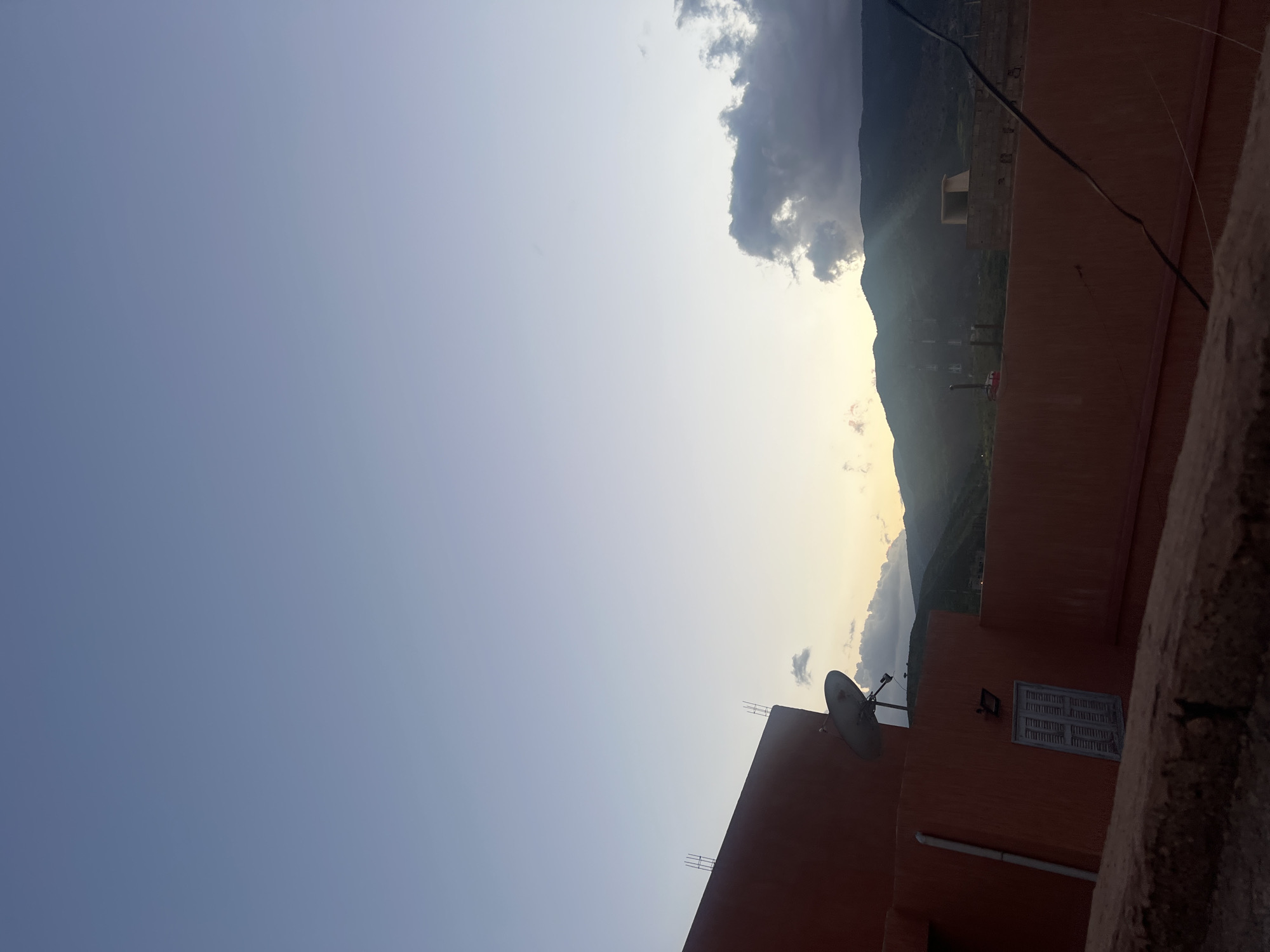 Daily life documented in Moroccan mountain town during sunset