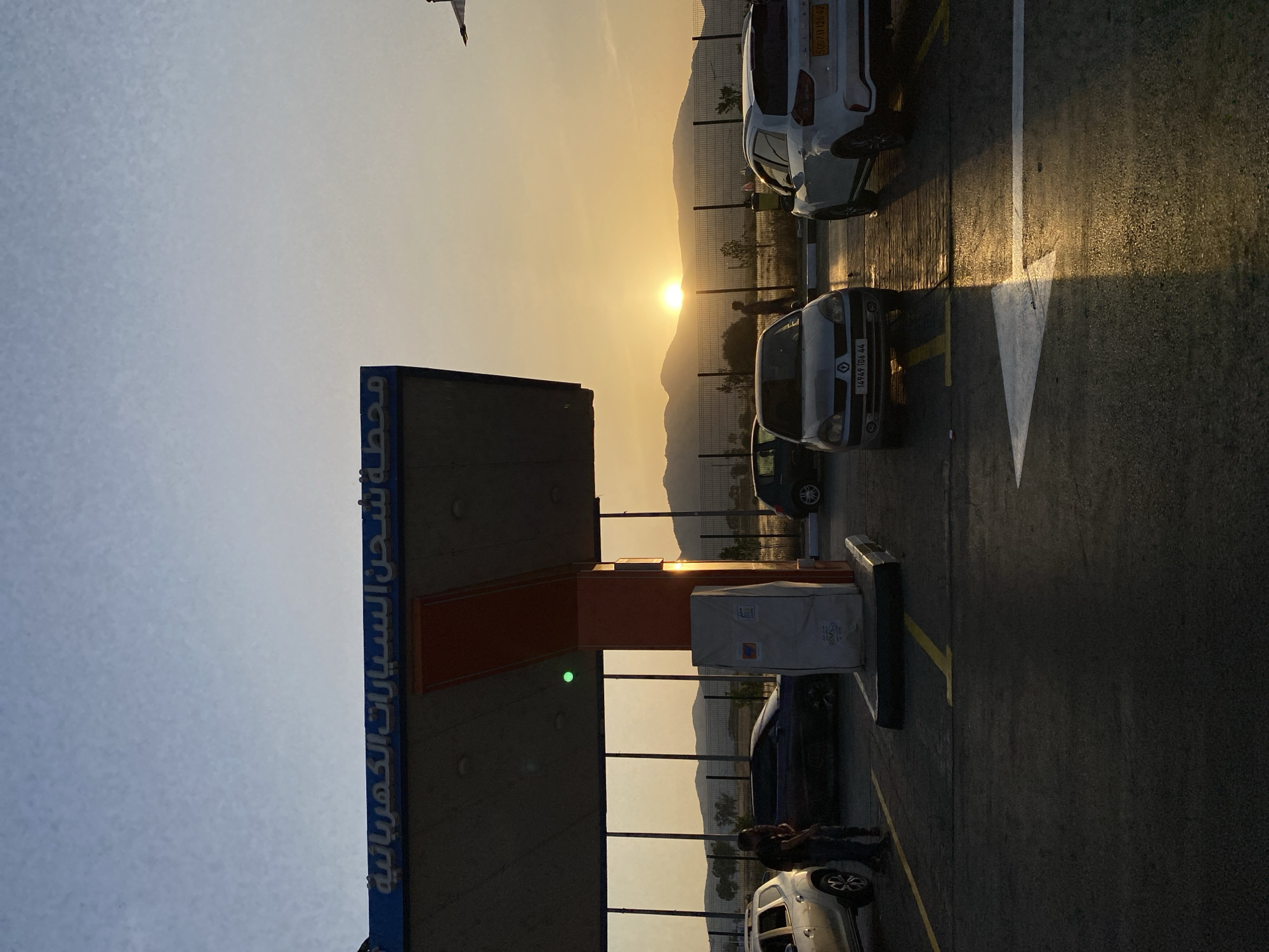 Electric charging station captured at sunset in Djelida, Algeria
