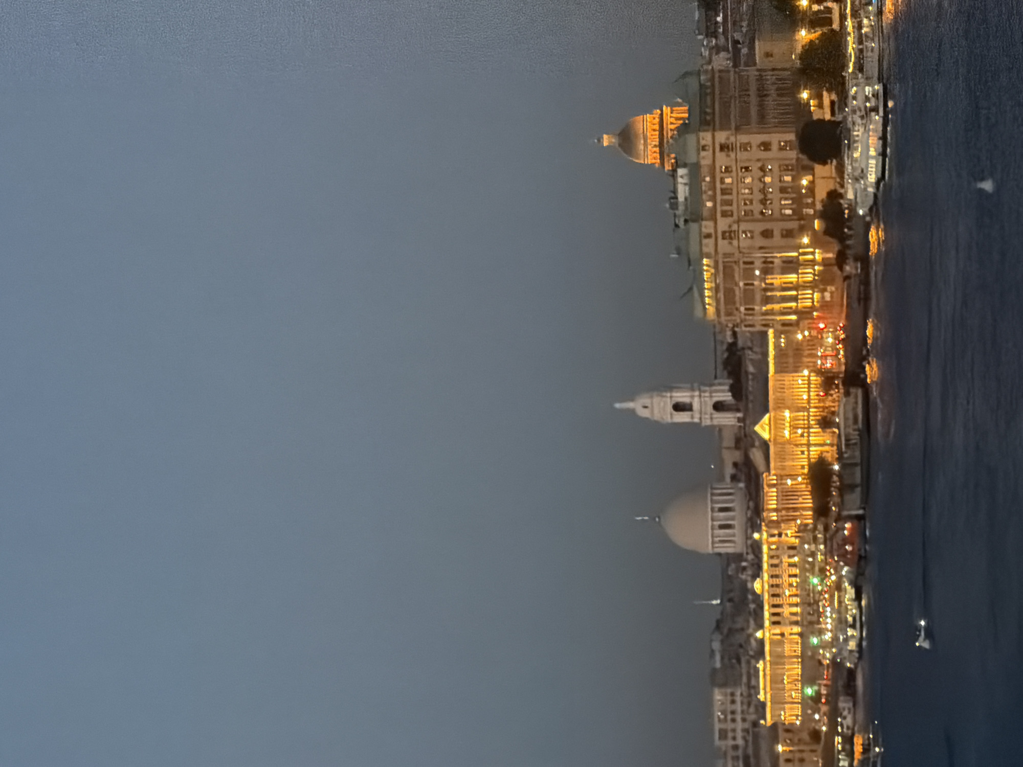 Passenger boat crosses the Neva at dusk, Saint Petersburg